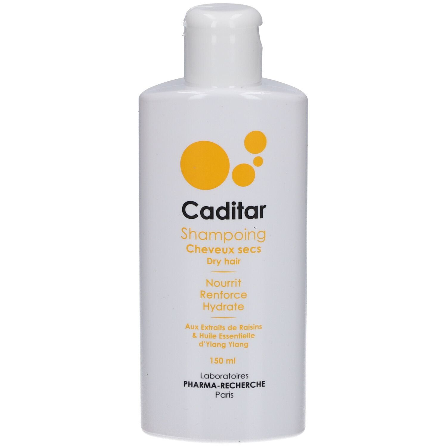 Flacon blanc avec étiquette jaune. Inscription: Caditar, Shampoing Cheveux secs, Nourrit, Renforce, Hydrate.