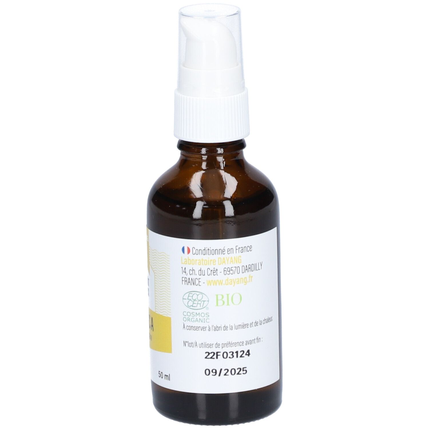 Bruine glazen fles met witte spraykop. Etiket met tekst, waaronder "ARNICA", bio-certificering en vervaldatum.