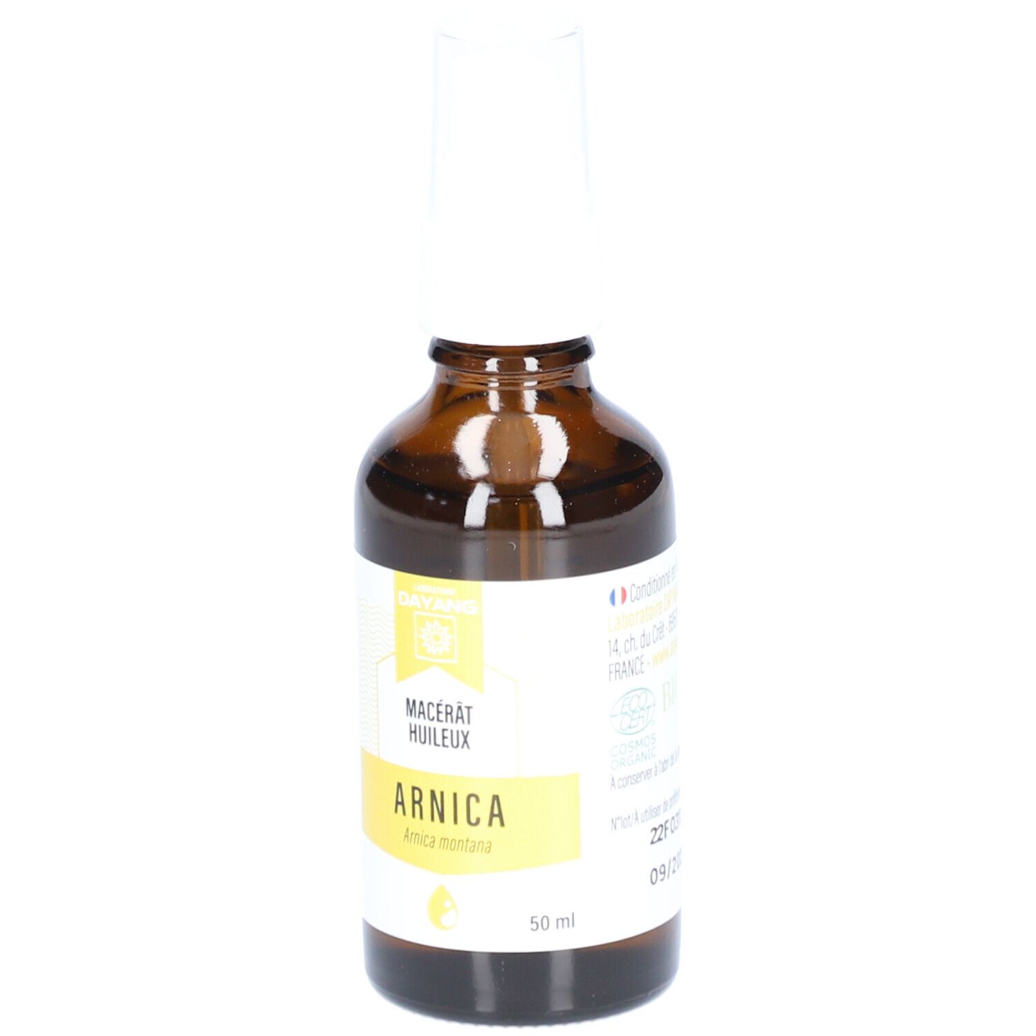 Bruine glazen fles met witte spraykop. Etiket met tekst, waaronder "ARNICA" en bio-certificering.
