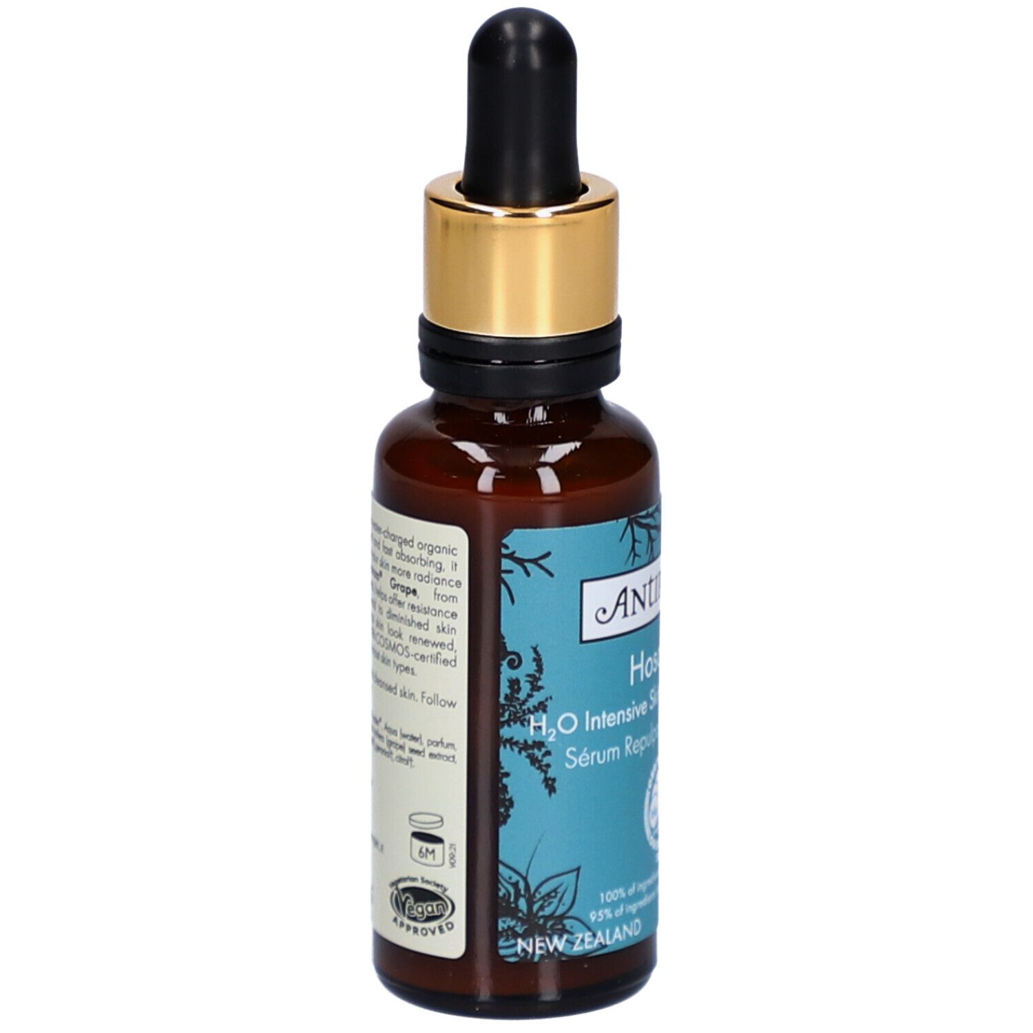 Bruine glazen fles met gouden dop en pipet. Opschrift: Antipodes Hosanna Serum. Gecertificeerd biologisch product.