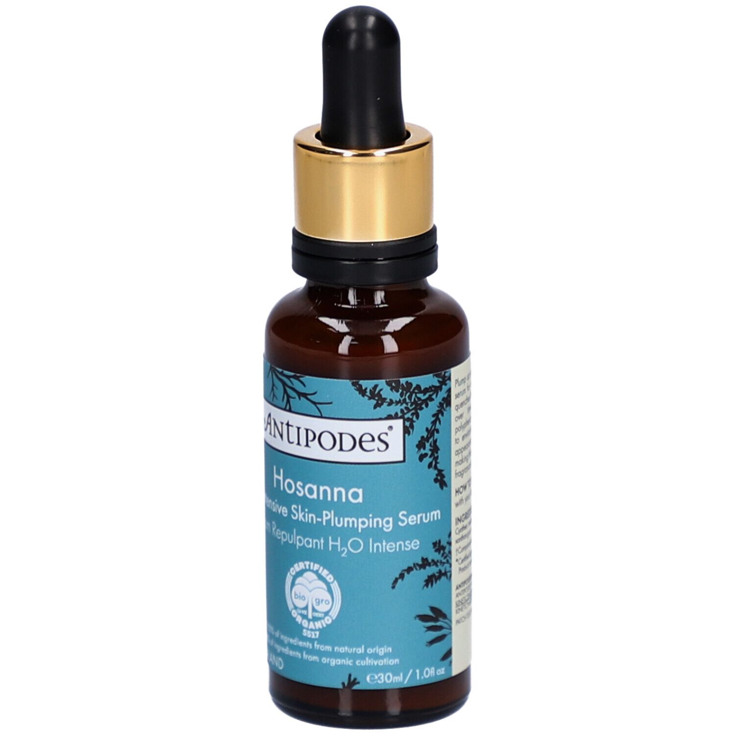 Bruine glazen fles met gouden dop en pipet. Opschrift: Antipodes Hosanna Serum. Gecertificeerd biologisch product.