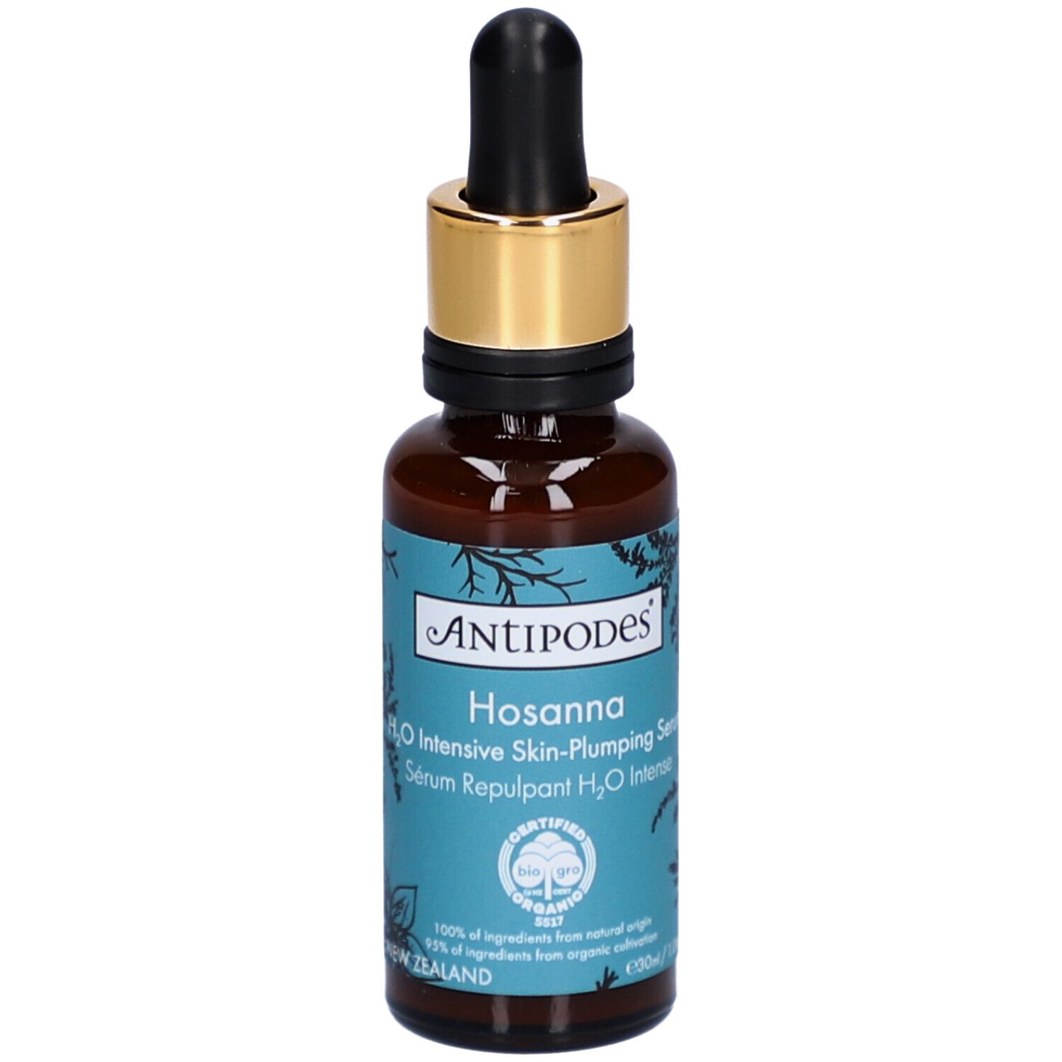 Bruine glazen fles met gouden dop en pipet. Opschrift: Antipodes Hosanna Serum. Gecertificeerd biologisch product.