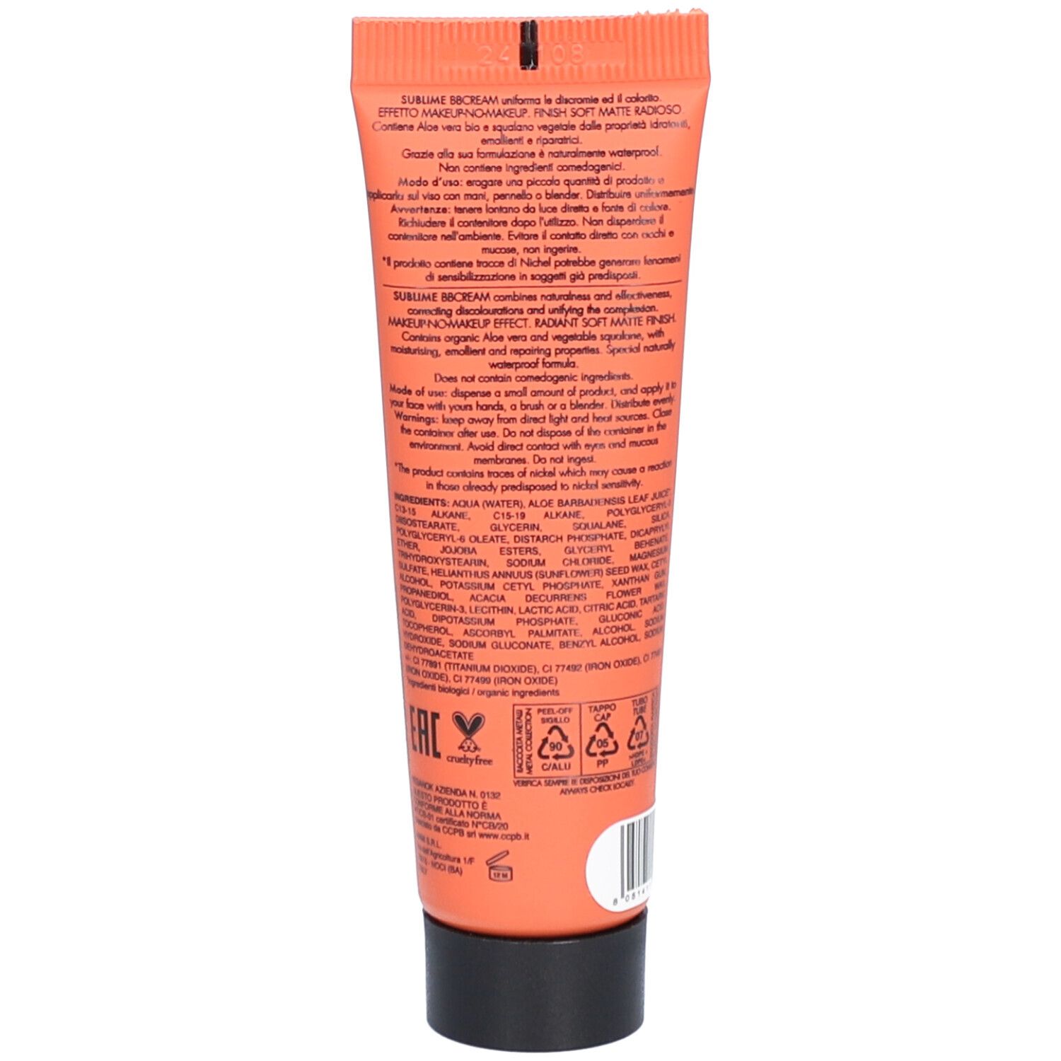 Achterkant van een oranje tube. Tekst: ingrediënten, gebruiksaanwijzing, fabrikantinfo. Zwarte dop.