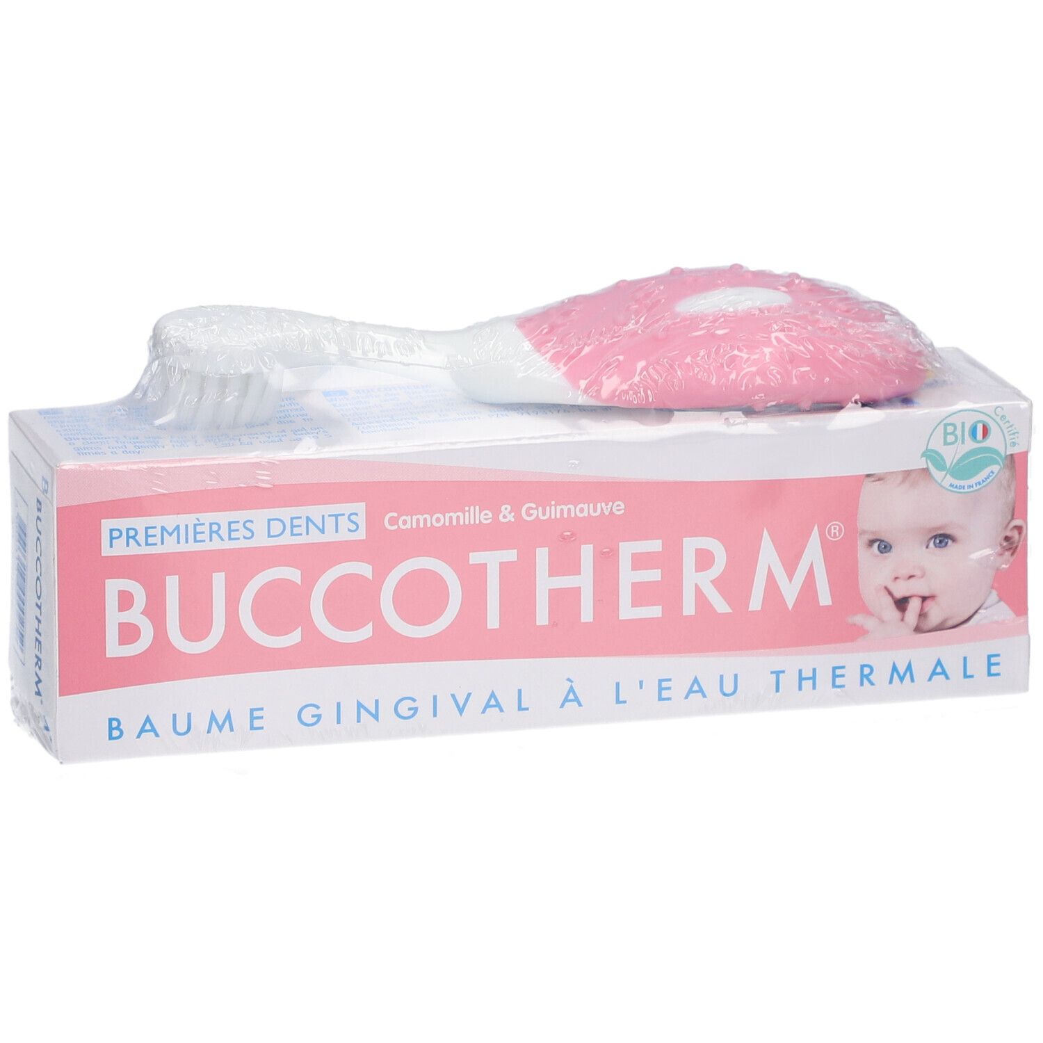 Emballage avec brosse à dents. Inscription: Buccotherm, Premières Dents, Baume Gingival à l'Eau Thermale. Label Bio.