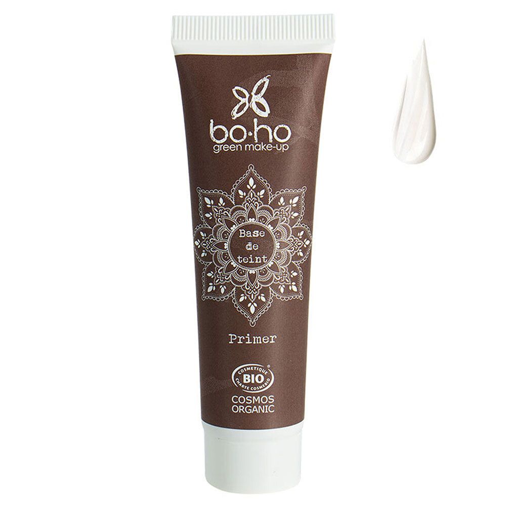 Bruine tube met witte dop. Opschrift: BOHO green make-up, Base de teint, Primer. Bio-certificering en productdruppel.