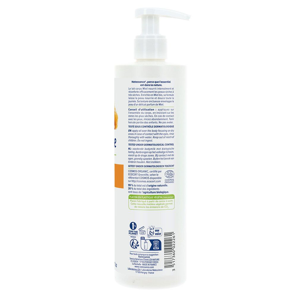 Achterkant witte fles. Franse tekst. Gebruiksinformatie. Bio-certificering. Milieukeurmerken. Chargenummer.