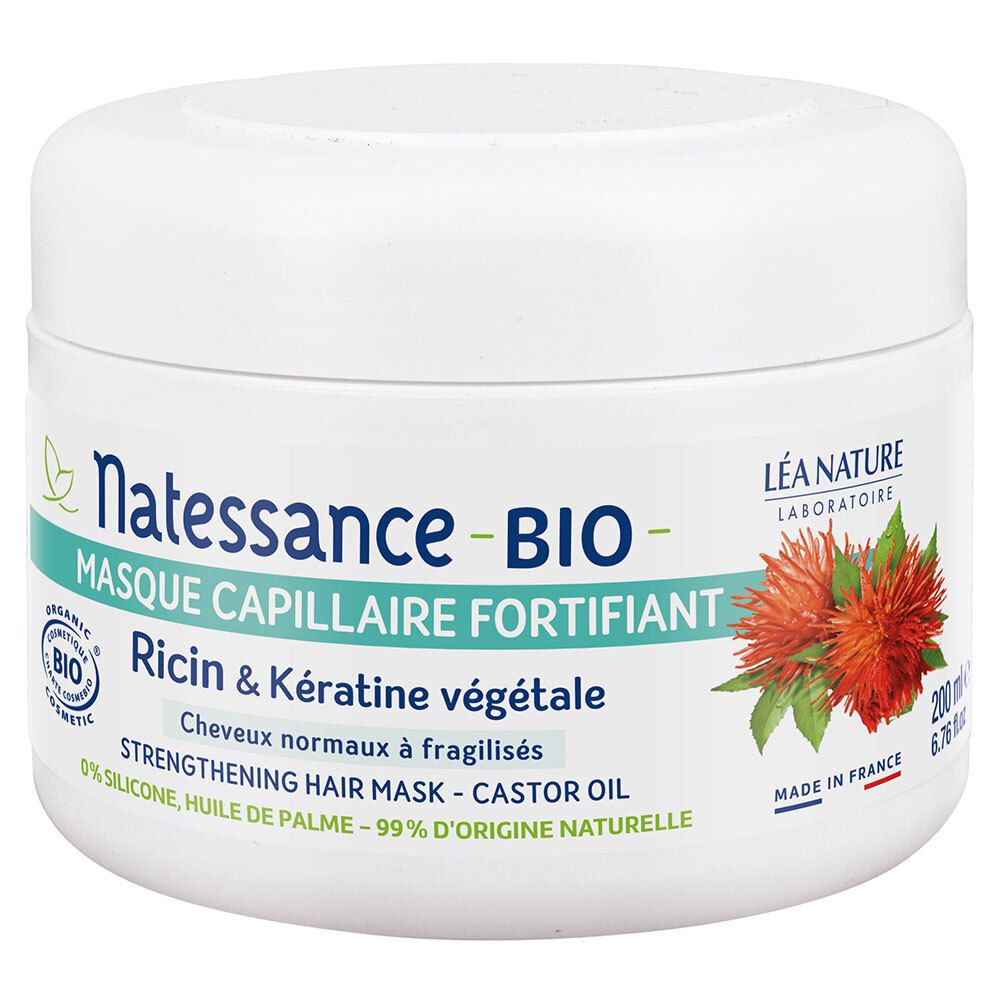 Witte pot met etiket. Tekst: Natessance BIO, haarmasker, ricinus & plantaardige keratine. Met bio-label.