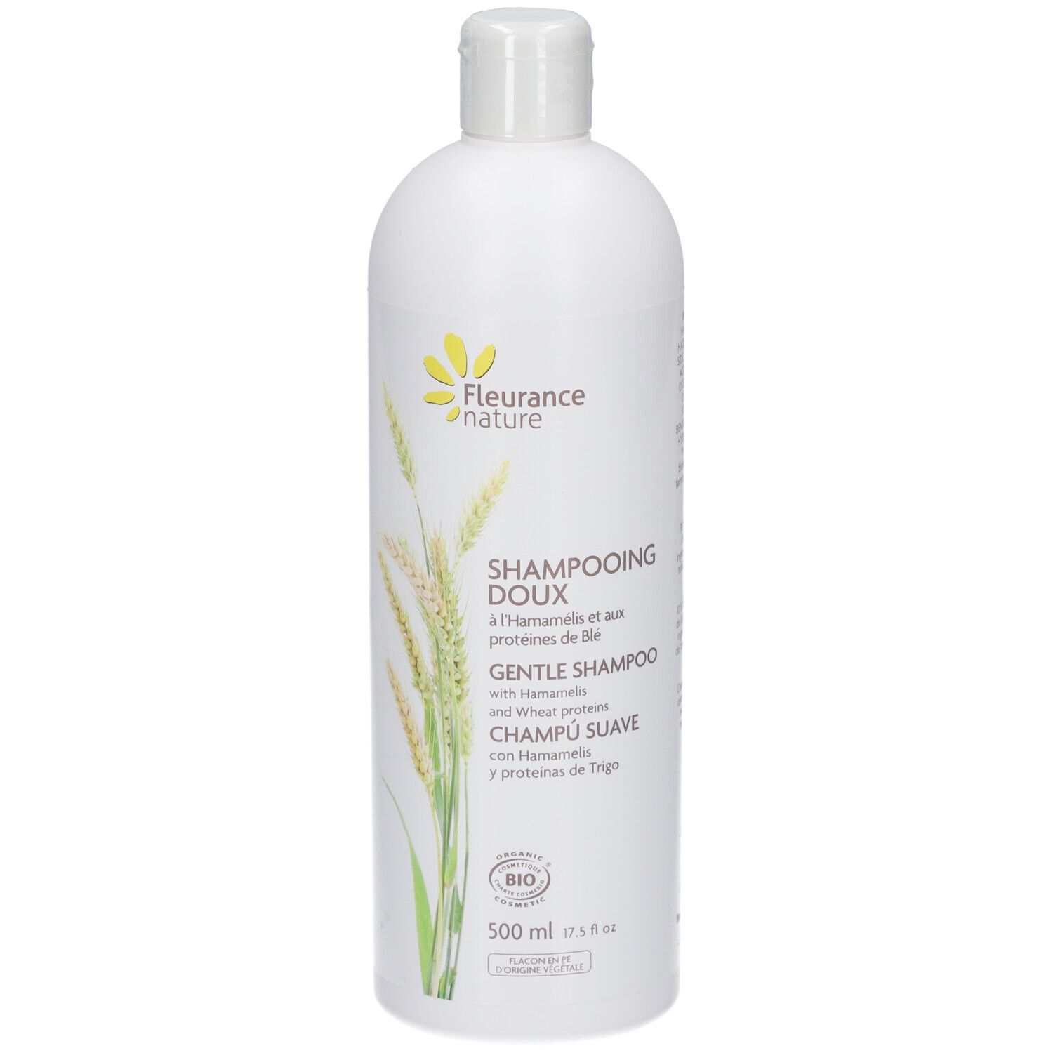 Witte shampoo fles. Tekst: DOUX, HAMAMELIS, tarweproteïnen. Bio-certificering. 500 ml.