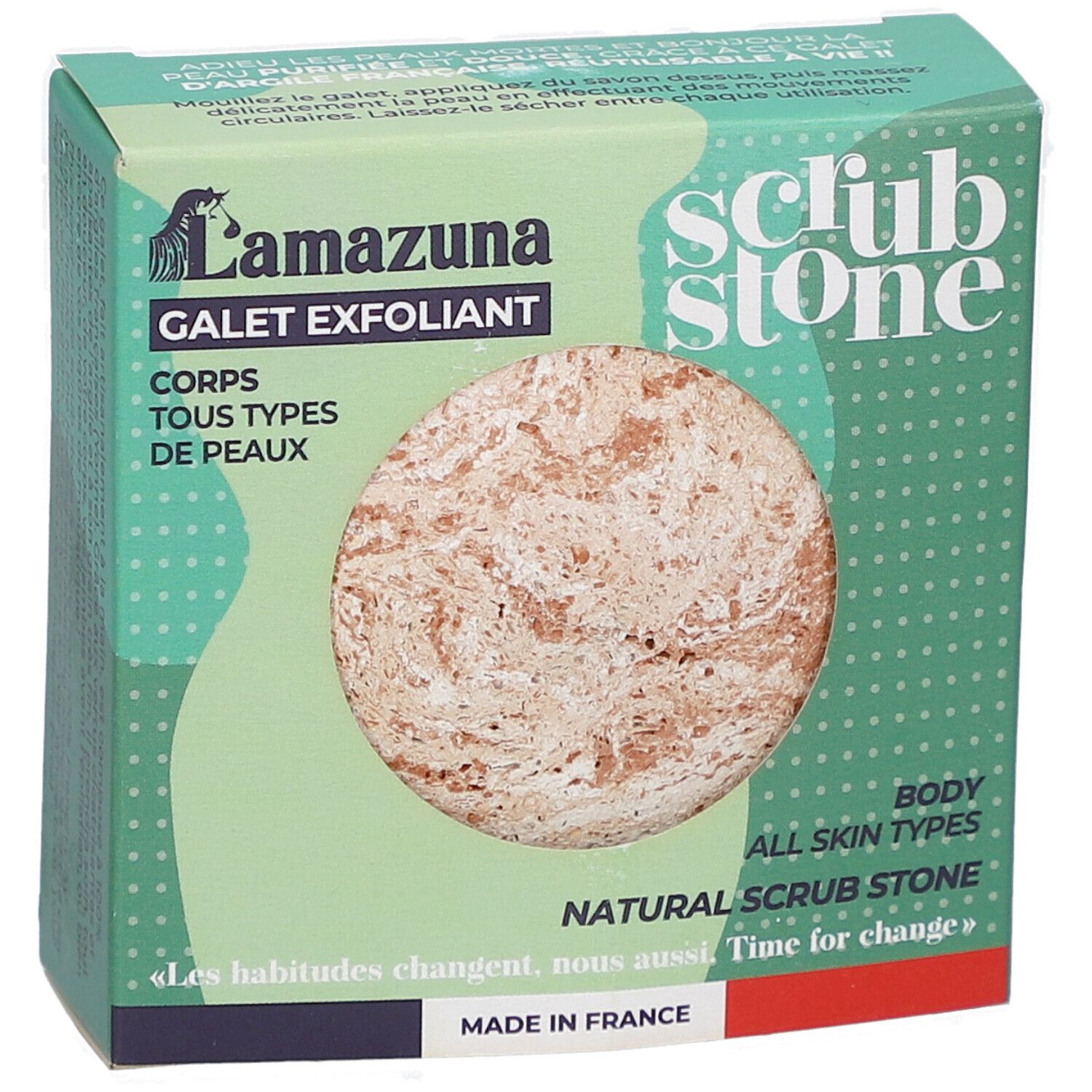 Groene doos met ronde scrubsteen. Opschrift: Lamazuna, Galet Exfoliant, Scrub Stone, voor alle huidtypes. Gemaakt in Frankrijk.