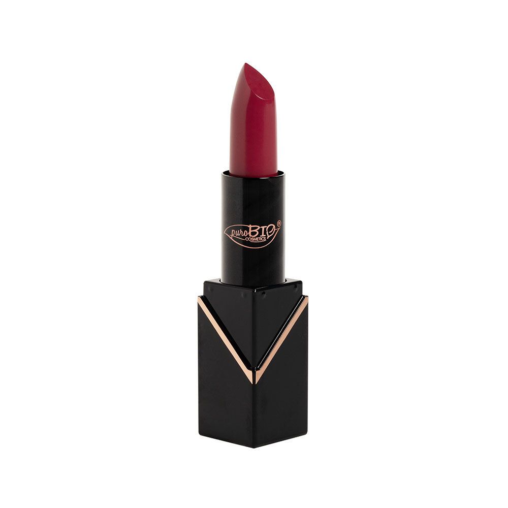 Rouge à lèvres rouge dans un étui noir avec des détails dorés. Marque visible.