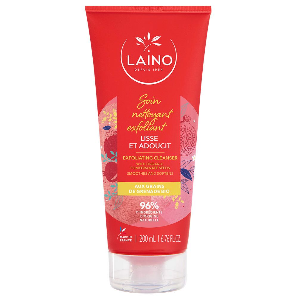 Tube rouge avec bouchon blanc. Logo LAINO et nom du produit. "Soin nettoyant exfoliant" et "Aux grains de grenade bio" sont visibles.