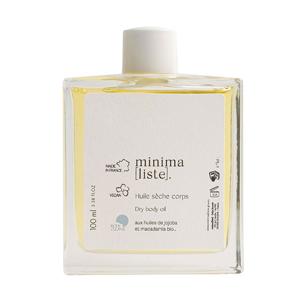 Flacon carré en verre transparent avec bouchon blanc. Étiquette avec nom du produit et ingrédients. 100 ml.