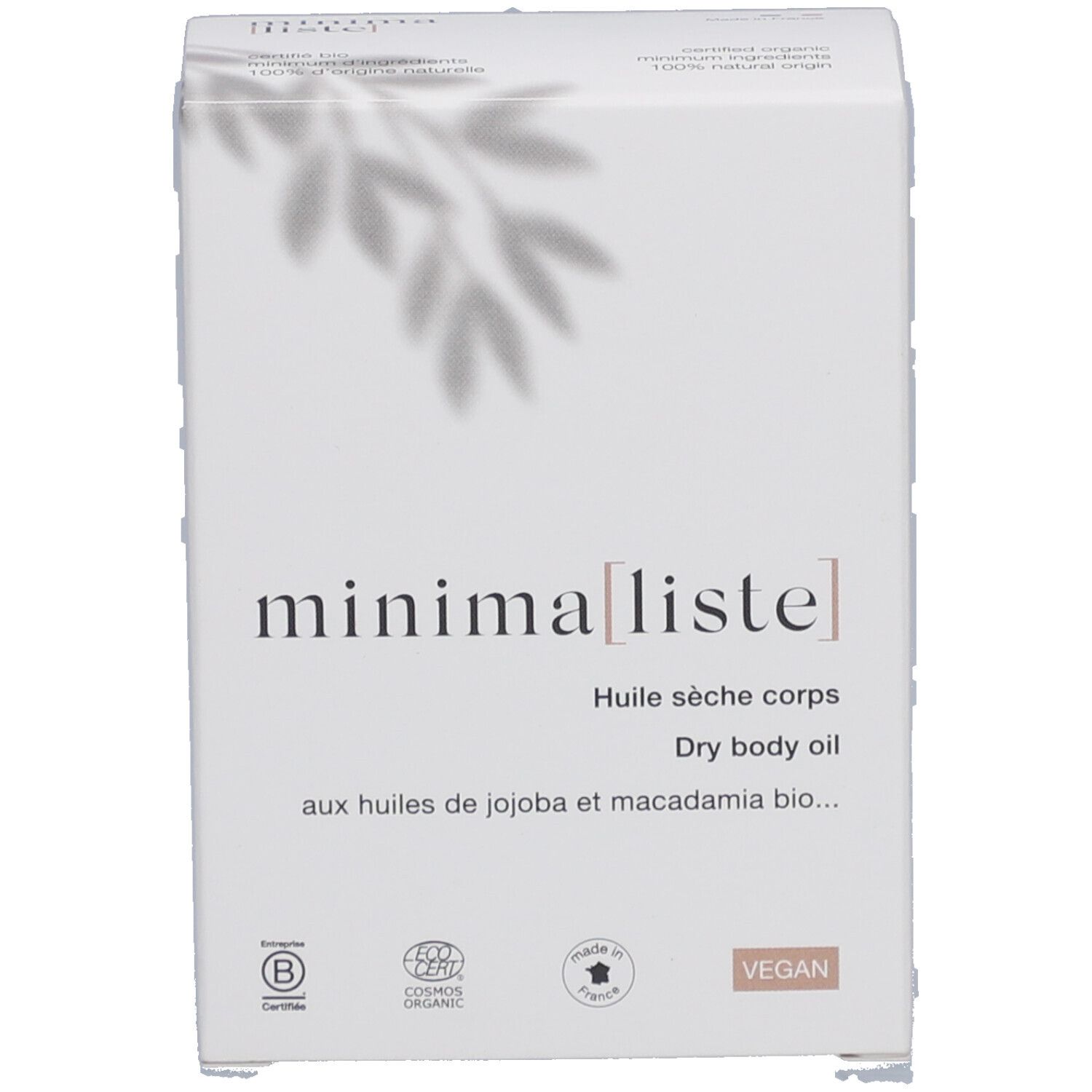 Witte verpakking met productnaam en informatie. Opschrift 'Huile sèche corps' en logo's.