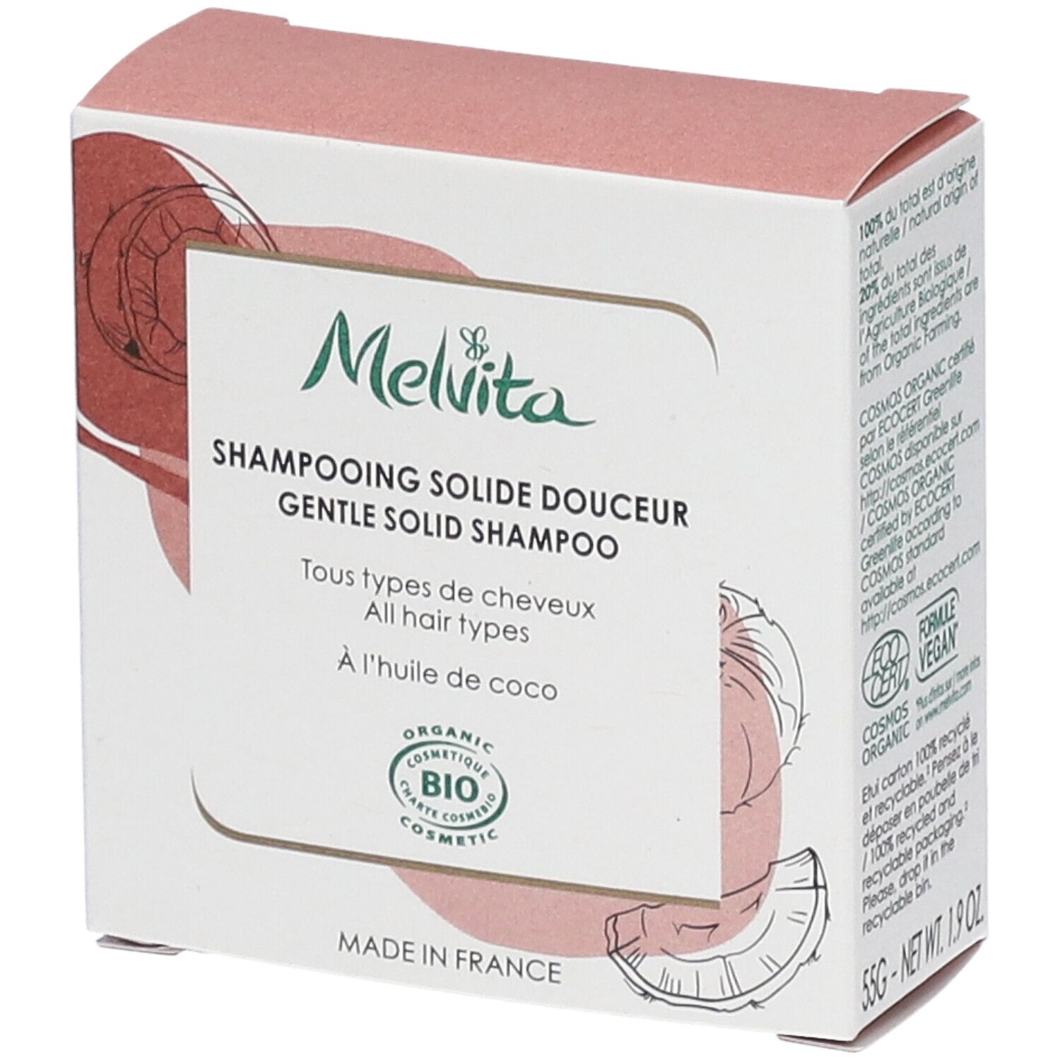 Doosje Melvita shampoo. Tekst: "Shampooing solide douceur", "BIO COSMETIC". Kokosnoot illustratie.