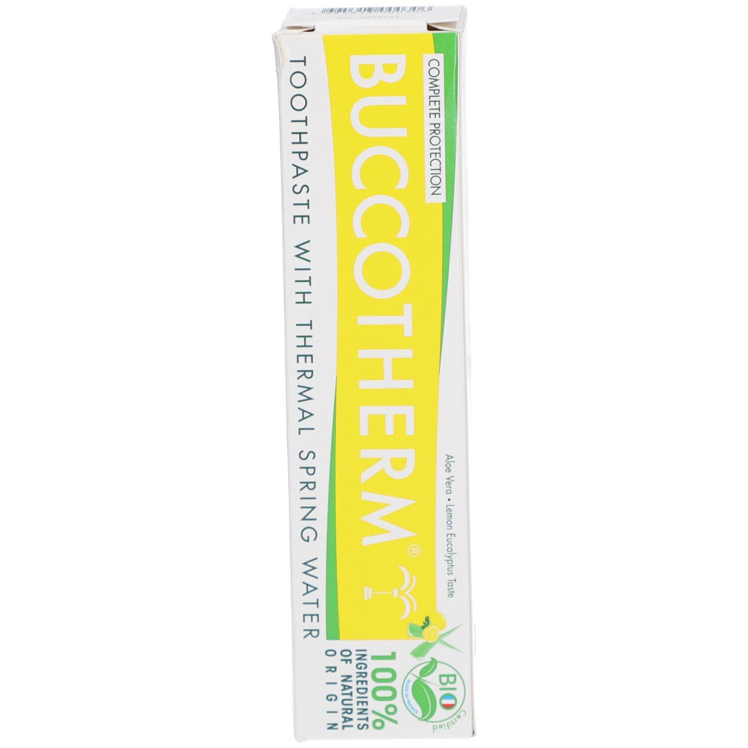 Boîte, blanche avec champ jaune. Inscription: BUCCOTHERM, Dentifrice à l'Eau Thermale, label Bio. Texte vert.