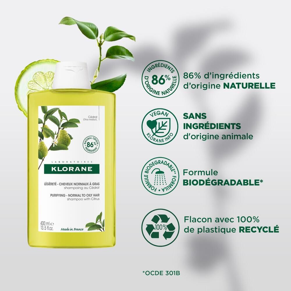 Shampooing jaune avec bouchon blanc. Inscription: KLORANE, 86% ingrédients naturels. Vegan, biodégradable.