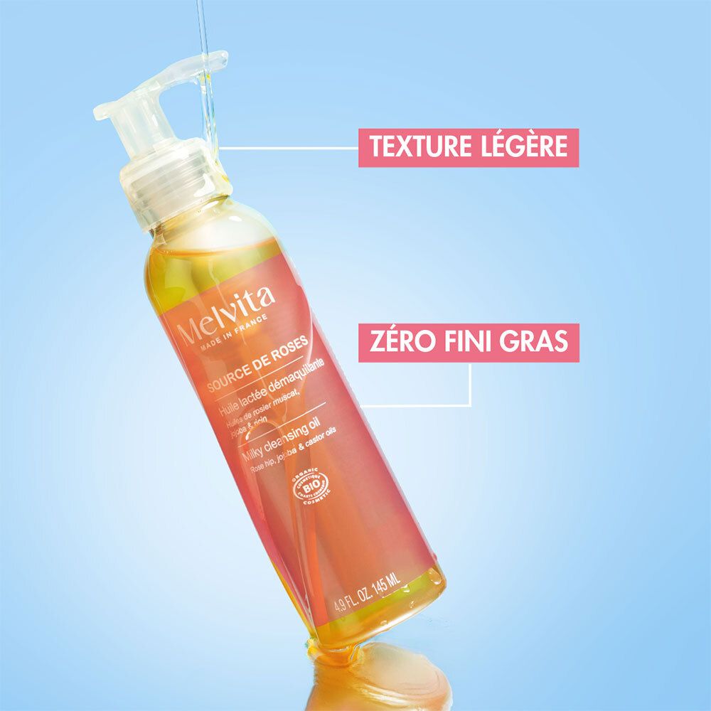Fles met pomp, gelige vloeistof. Tekst: Melvita, Source de Roses. Tekst: Texture légère, zéro fini gras.