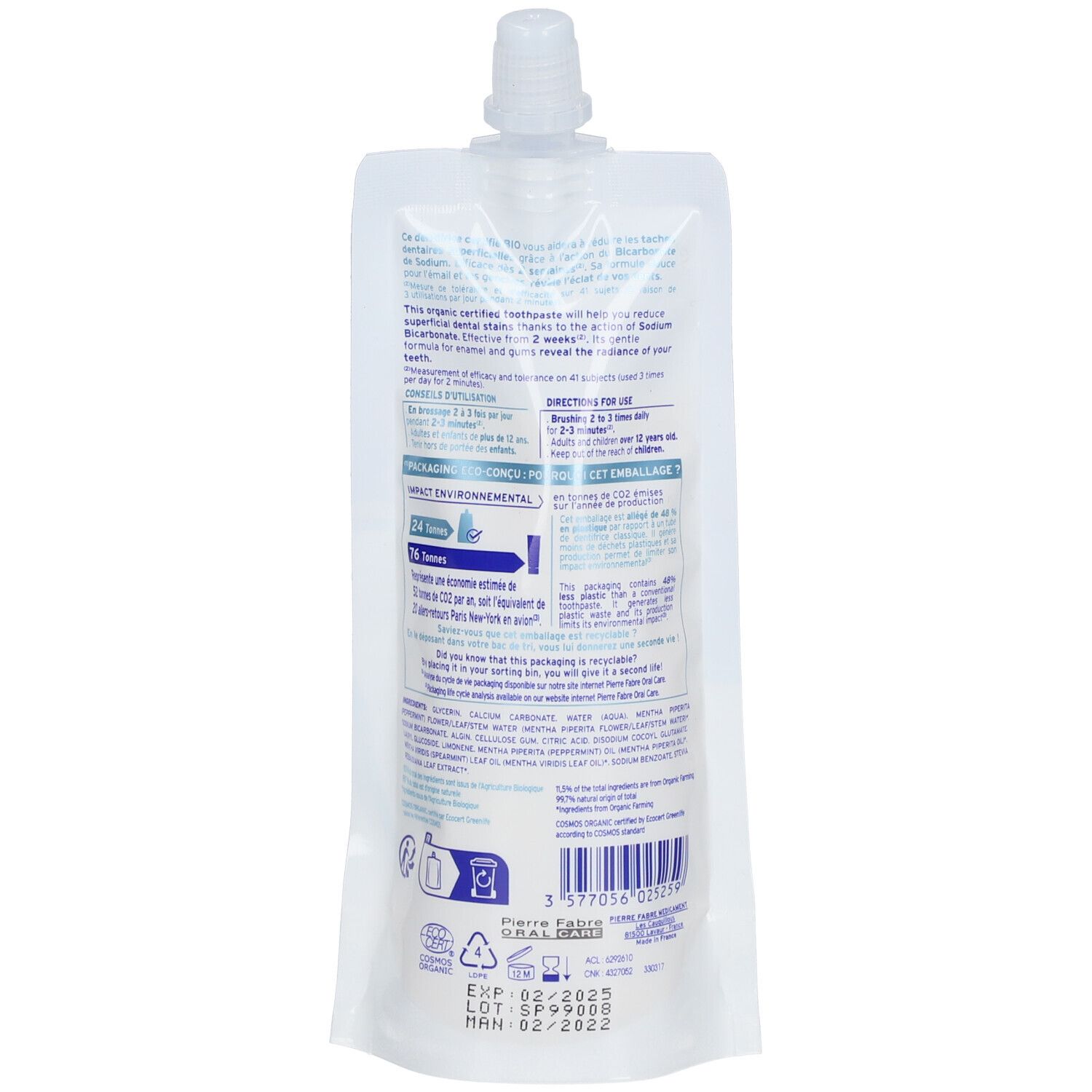 Sachet de dentifrice. Emballage transparent avec contenu blanc. Texte multilingue. Inscriptions : date de péremption, numéro de lot, logo.