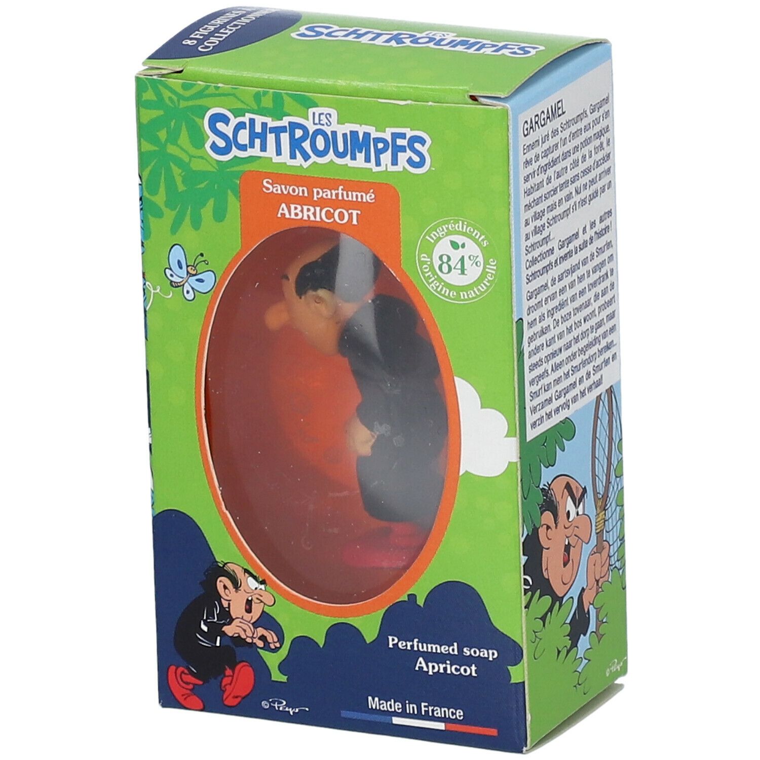 Zeep met Gargamel-figuur in doos. Groene doos met tekst en illustraties. Product zichtbaar door venster.