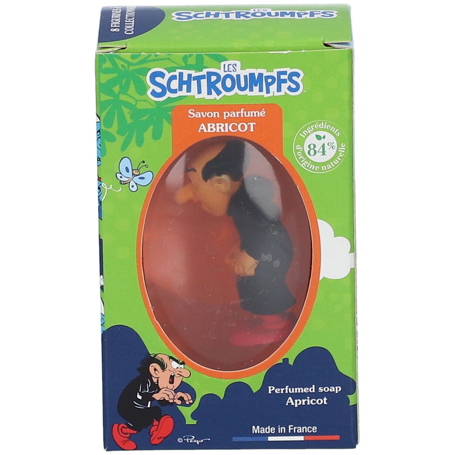 Zeep met Gargamel-figuur in doos. Groene doos met tekst en illustraties. Product zichtbaar door venster.