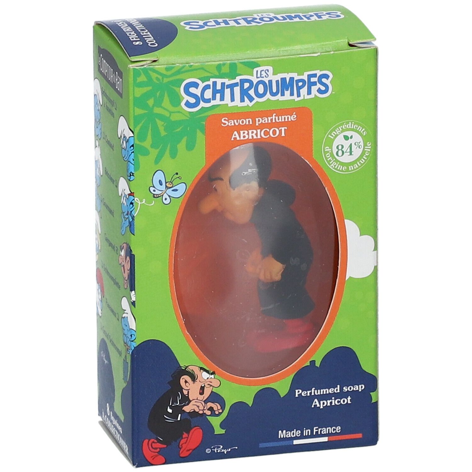 Zeep met Gargamel-figuur in doos. Groene doos met tekst en illustraties. Product zichtbaar door venster.
