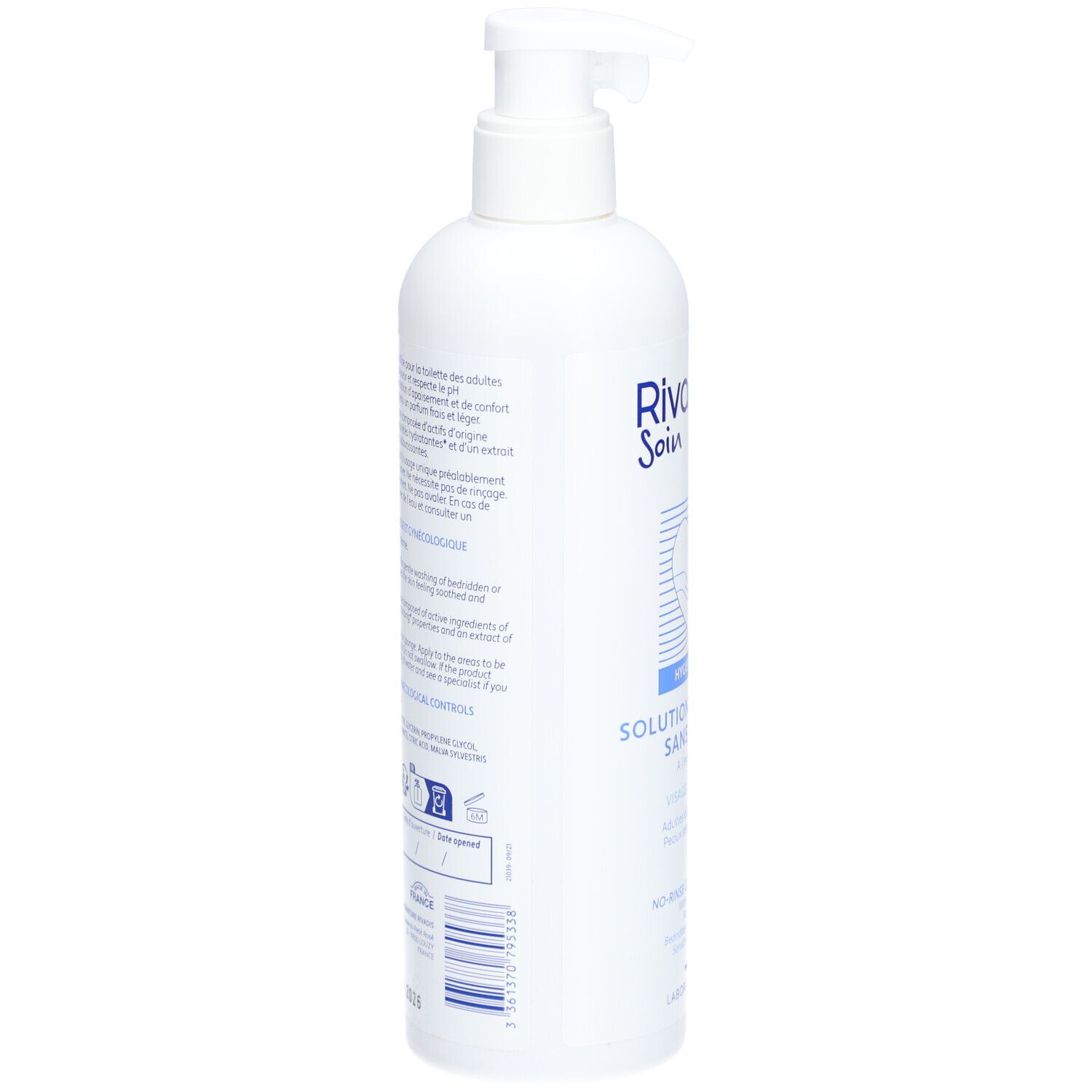 Flacon blanc avec pompe doseuse. Texte au dos. Code-barres et logos. Nom du produit non visible.