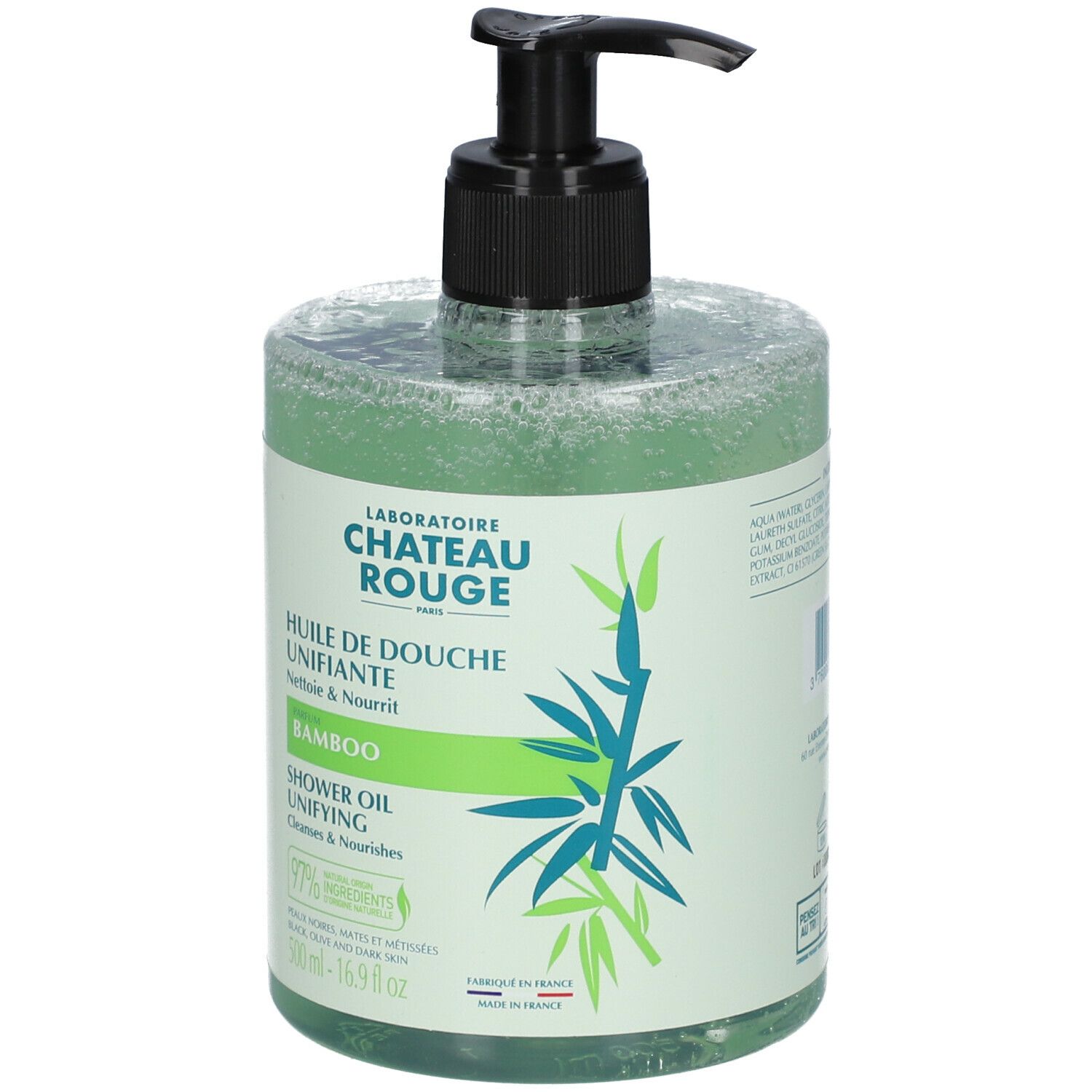 Transparante fles met groene doucheolie. Zwarte pompsluiting. Opschrift: Laboratoire Château Rouge, Bamboo, Shower Oil.