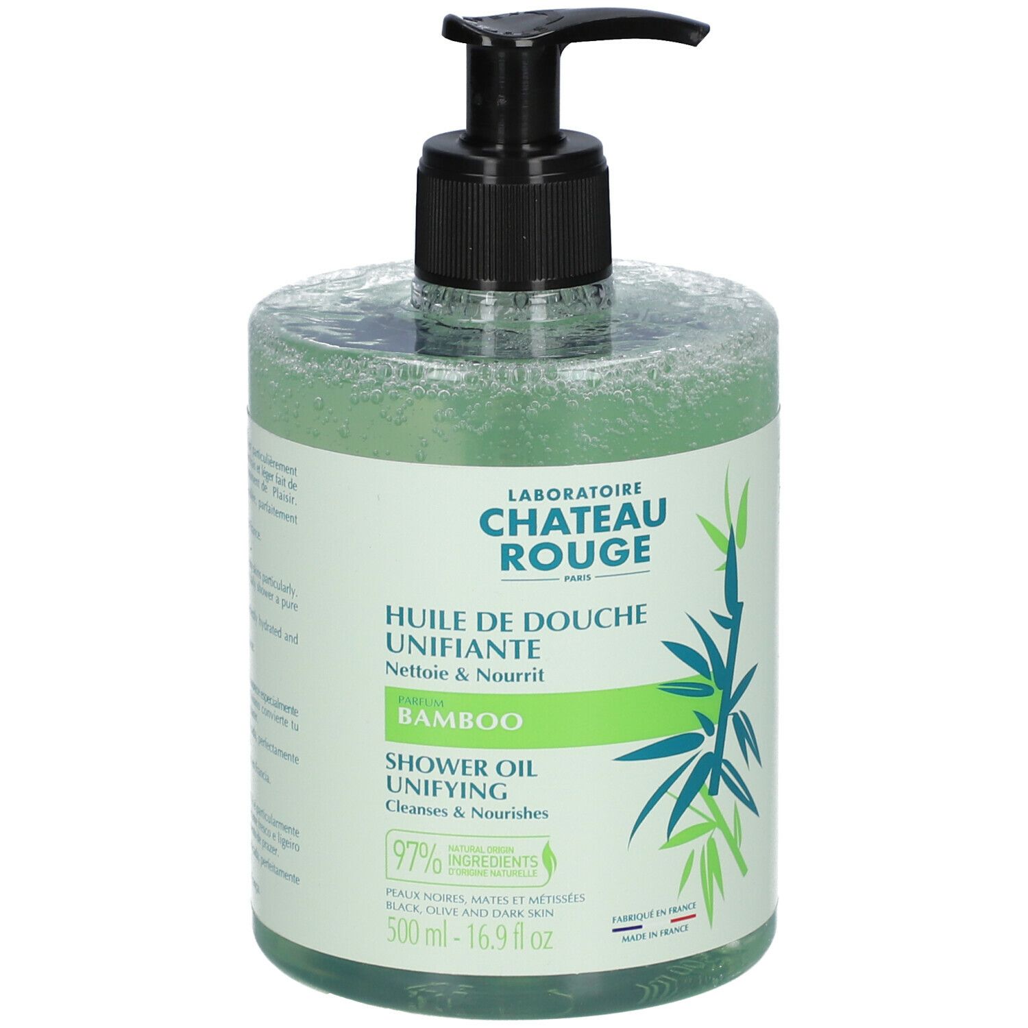 Transparante fles met groene doucheolie. Zwarte pompsluiting. Opschrift: Laboratoire Château Rouge, Bamboo, Shower Oil.