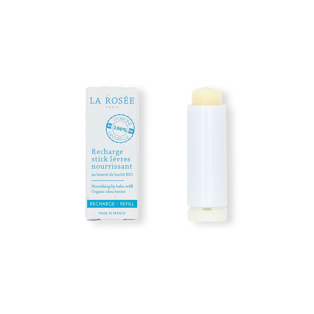 Stick lèvres et étui blancs. Nom du produit et logo sur l'étui. Stick avec embout jaune.