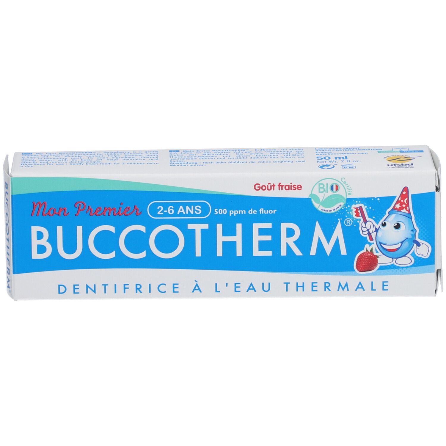 Boîte de dentifrice, bleu et blanc. Inscription: BUCCOTHERM, 2-6 ANS, goût fraise bio. Avec personnage de dessin animé.