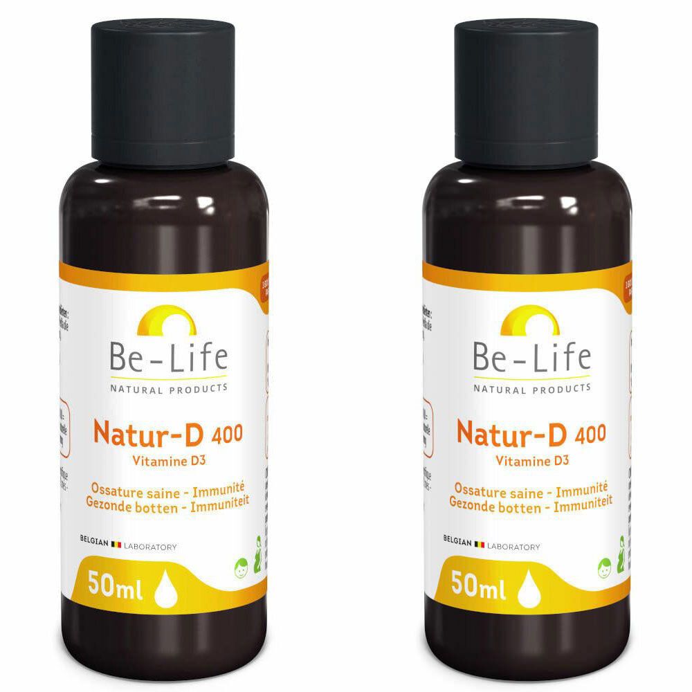 Twee bruine flessen met zwarte dop. Etiket: "Be-Life Natur-D 400 Vitamine D3". Inhoud 50ml.
