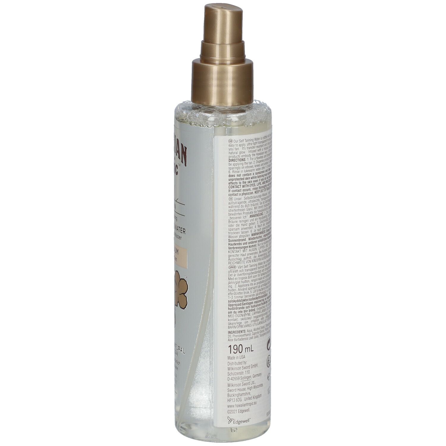 Spray autobronzant Hawaiian Tropic. Bouteille transparente avec vaporisateur doré. Inscription: Hawaiian Tropic, Self Tan, 190ml.