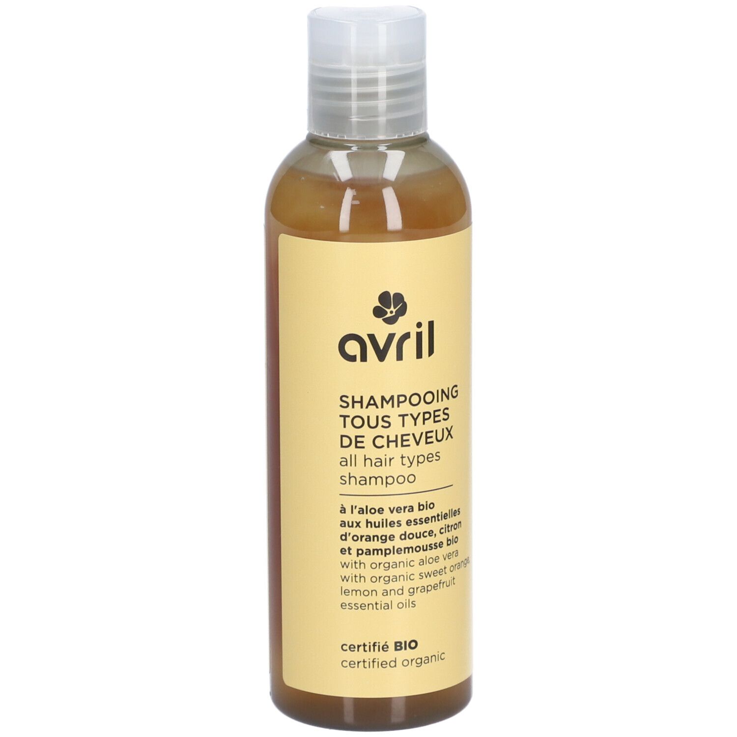 Fles Shampooing Tous Types de Cheveux. Geel etiket met logo en info. Gecertificeerd BIO, met aloë vera.
