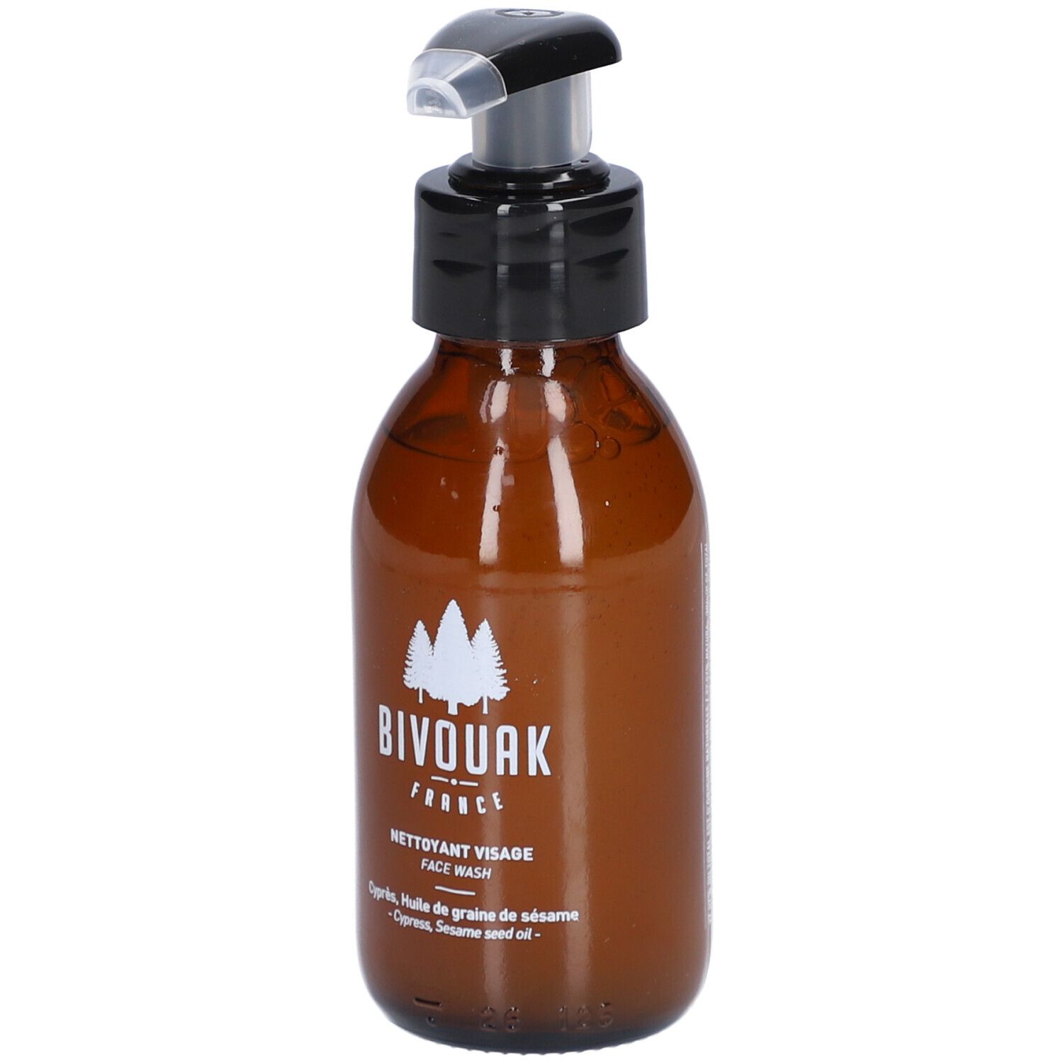 Bruine glazen fles met zwarte pomp. Opschrift: BIVOUAK FRANCE, NETTOYANT VISAGE FACE WASH.