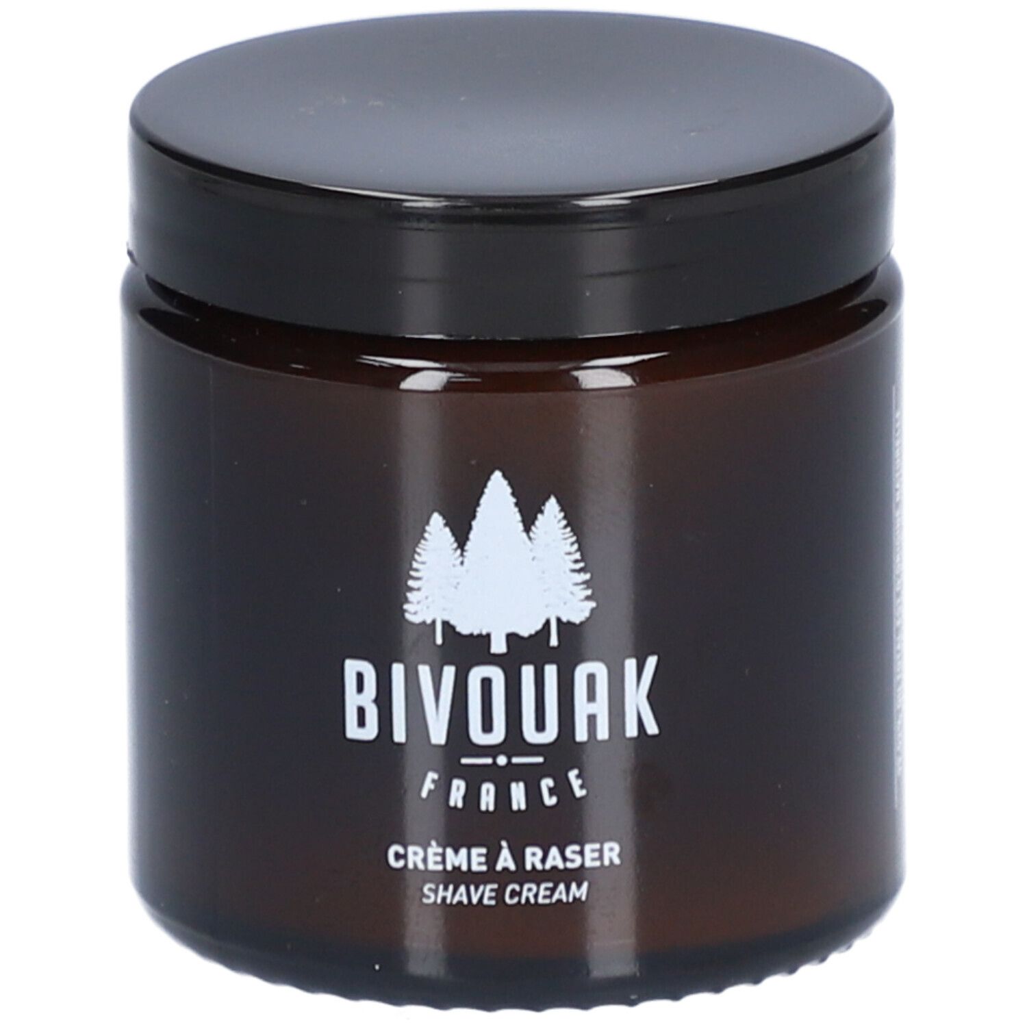 Bruine glazen pot met zwarte deksel. Opschrift: BIVOUAK FRANCE, Crème à raser, Shave Cream. Wit logo met bomen.