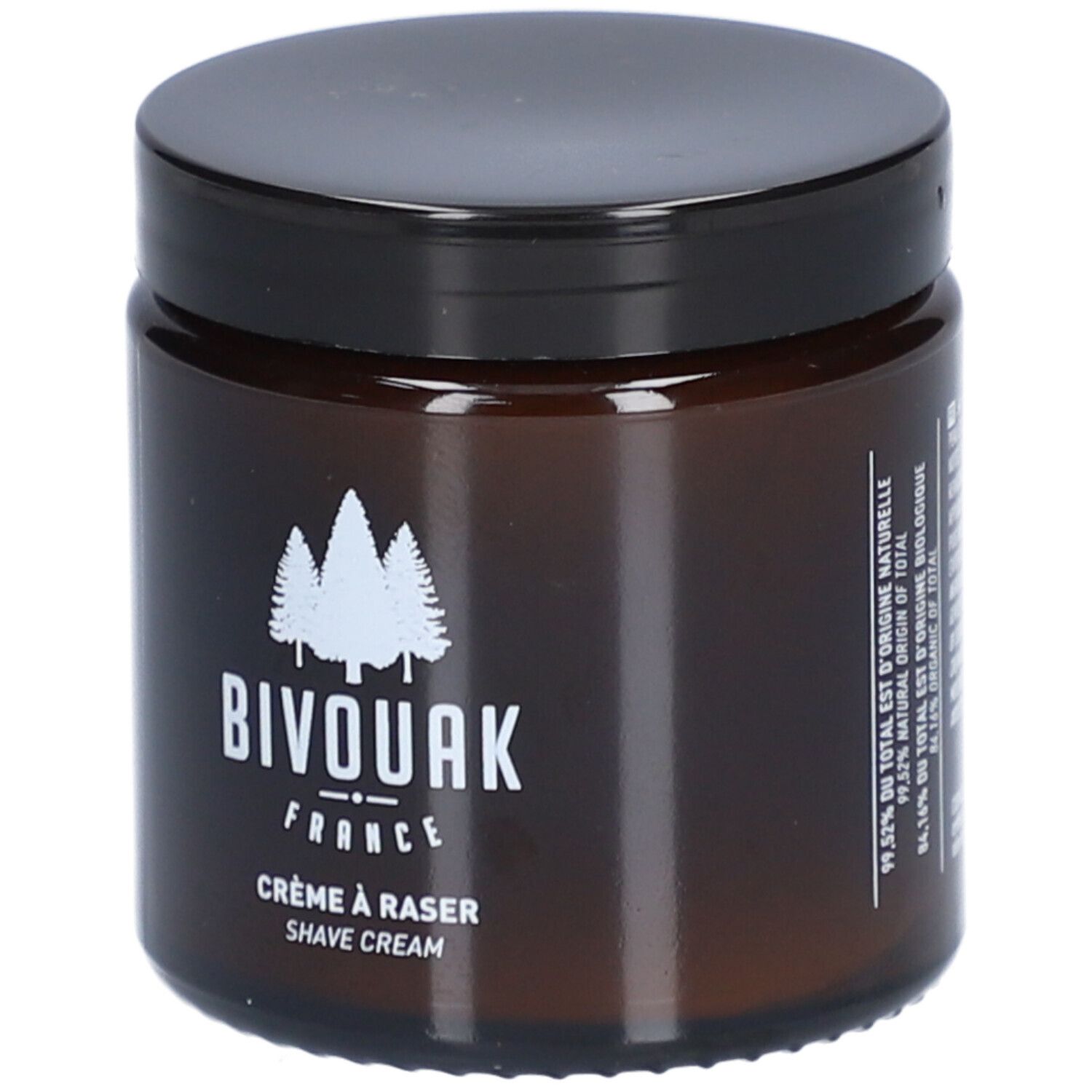 Bruine glazen pot met zwarte deksel. Opschrift: BIVOUAK FRANCE, Crème à raser, Shave Cream. Wit logo met bomen.