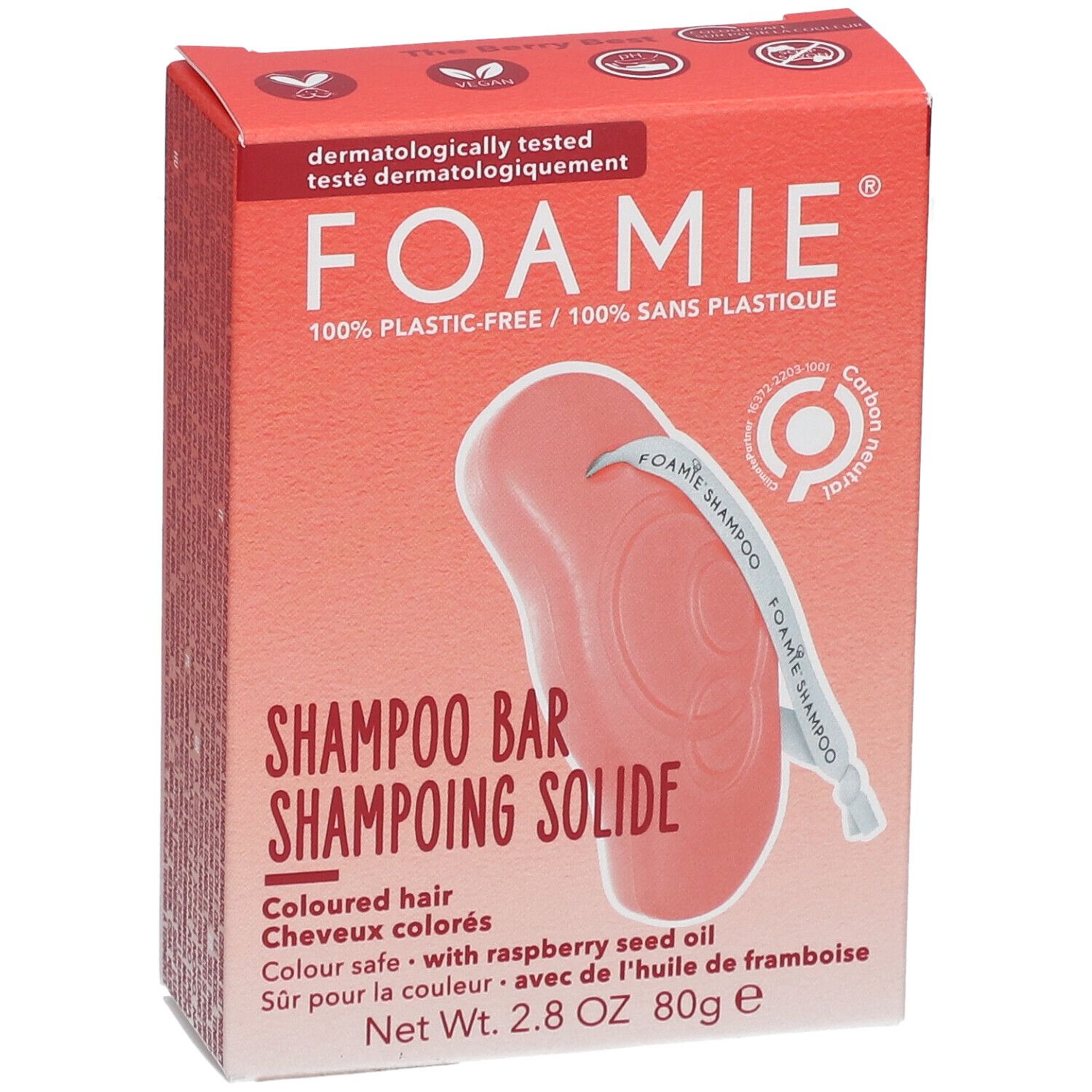 Rode doos met Shampoo Bar. Opschrift: FOAMIE, Shampoo Bar, voor gekleurd haar. Bevat frambozenpitolie. Close-up.