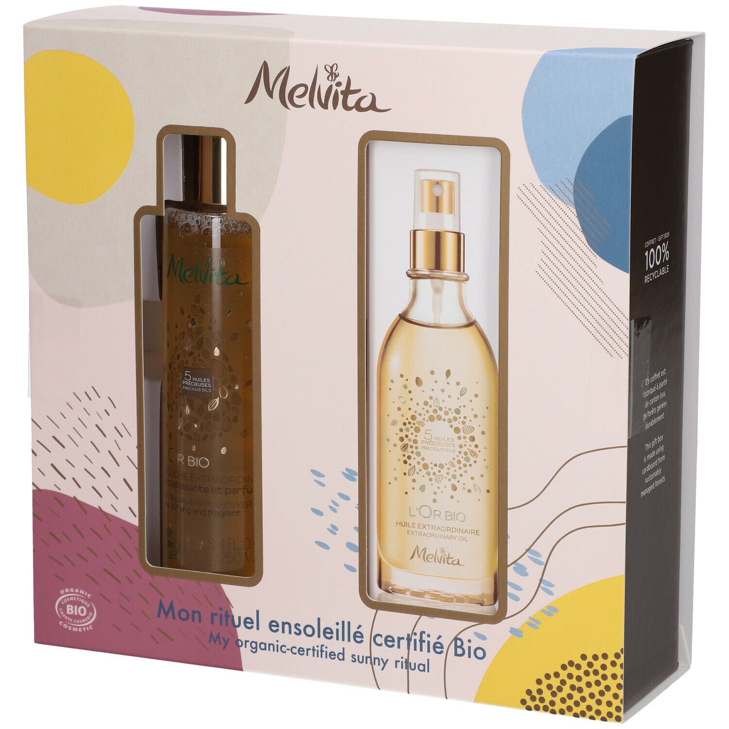 Melvita geschenkverpakking met twee producten. Fles met verstuiver en fles met schroefdop. Opschrift: L'Or BIO, Mon rituel ensoleillé certifié Bio. Bio gecertificeerd.