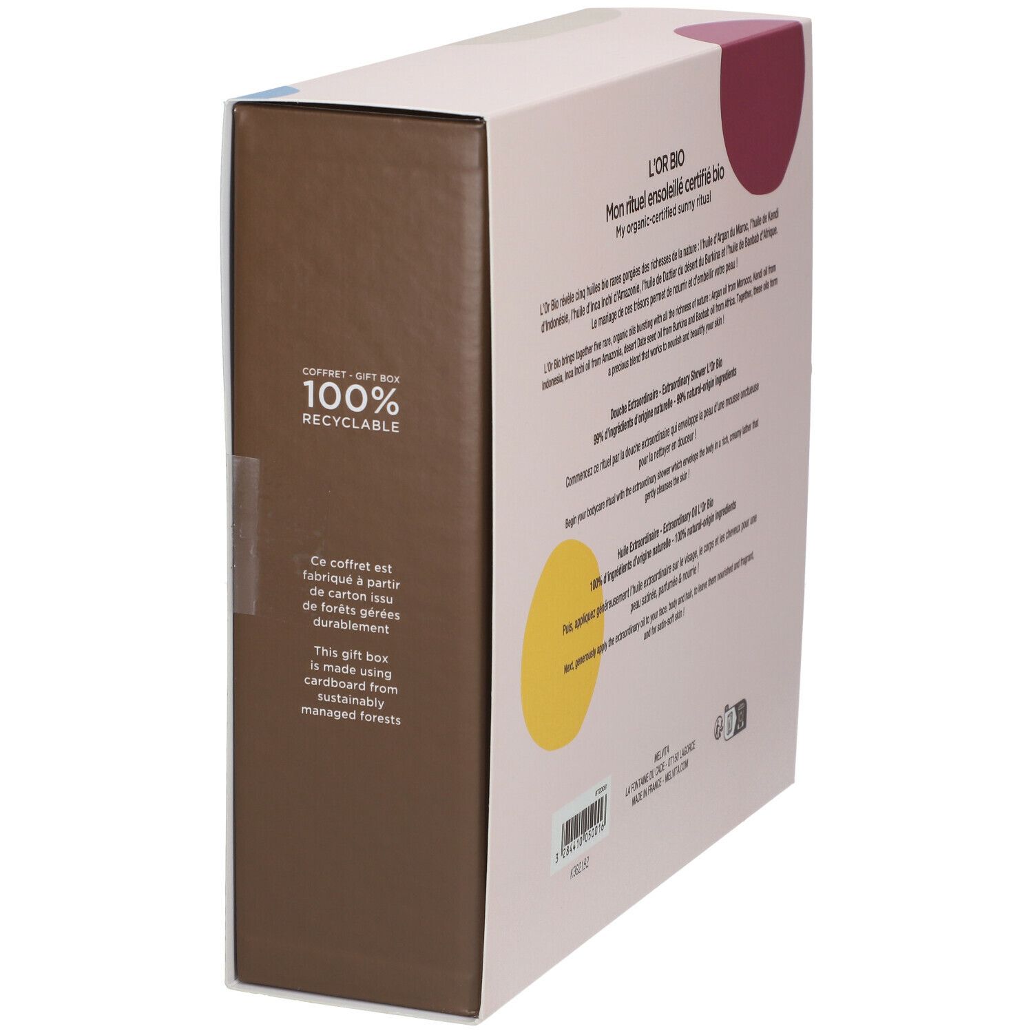 Geschenkverpakking, achterkant. Opschrift: L'Or BIO, Mon rituel ensoleillé certifié Bio. Tekst over ingrediënten en duurzaamheid. Logo: 100% recyclebaar.