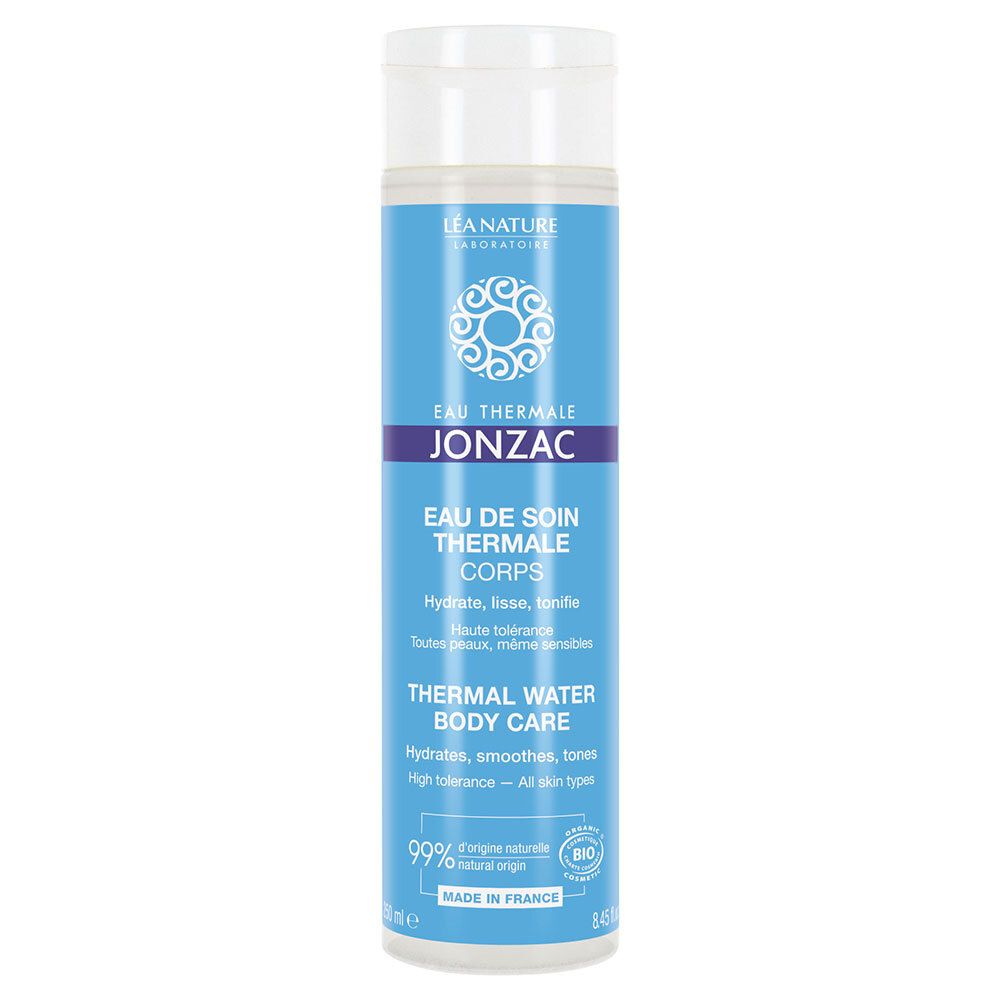 Flacon bleu et blanc. Texte: Eau Thermale Jonzac, Thermal Water Body Care. Certification bio.