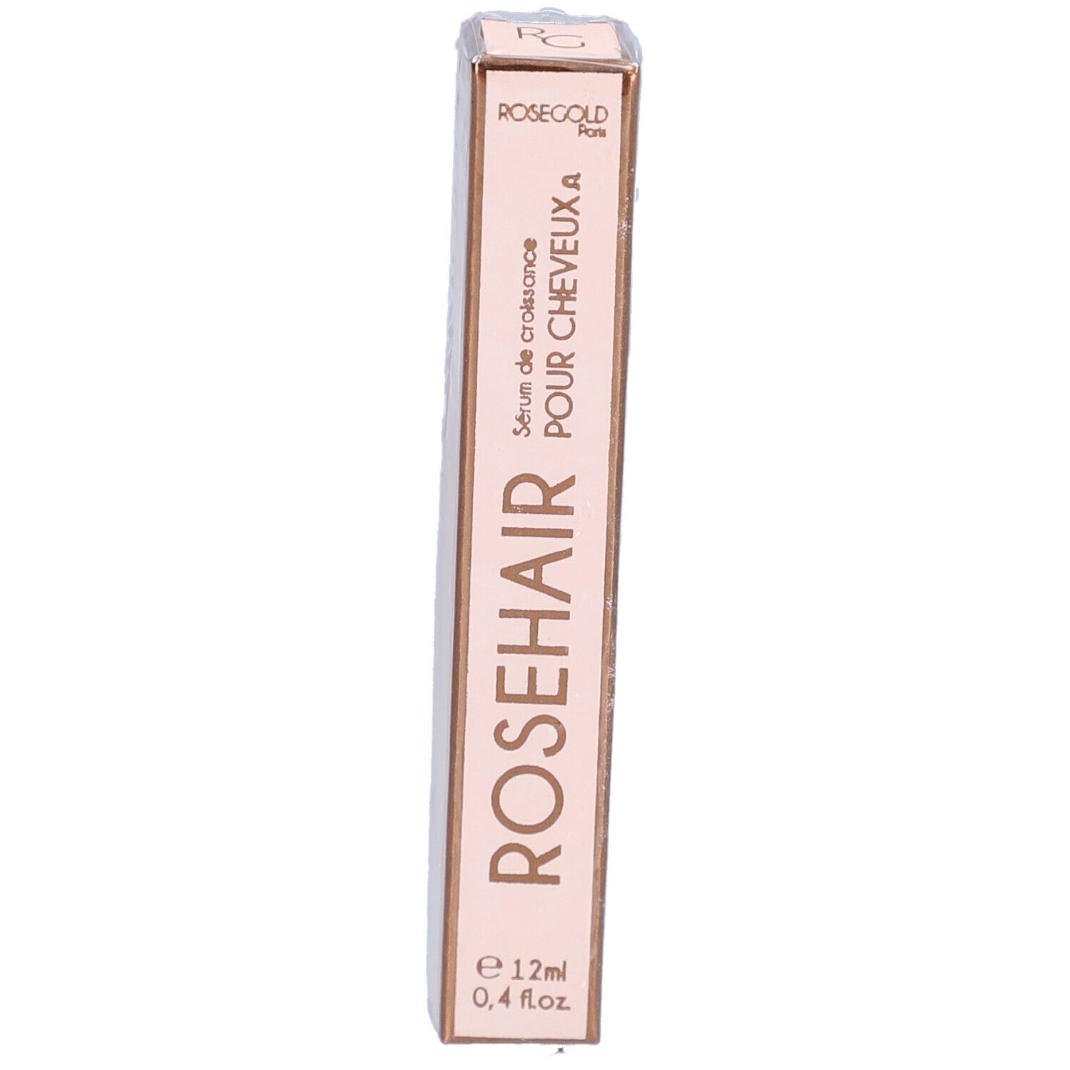 Emballage fin rose. Inscription: ROSEHAIR, Sérum de croissance POUR CHEVEUX A, e 12ml, 0,4 fl.oz. ROSEGOLD Paris.