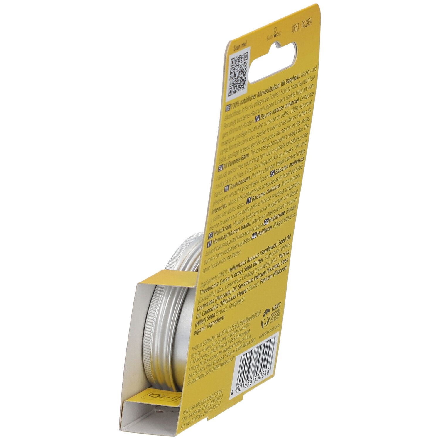 Gele verpakking, achterkant. Tekst in meerdere talen. Ingrediëntenlijst. Opschrift: WELEDA, 100% natuurlijke All Purpose Balm.