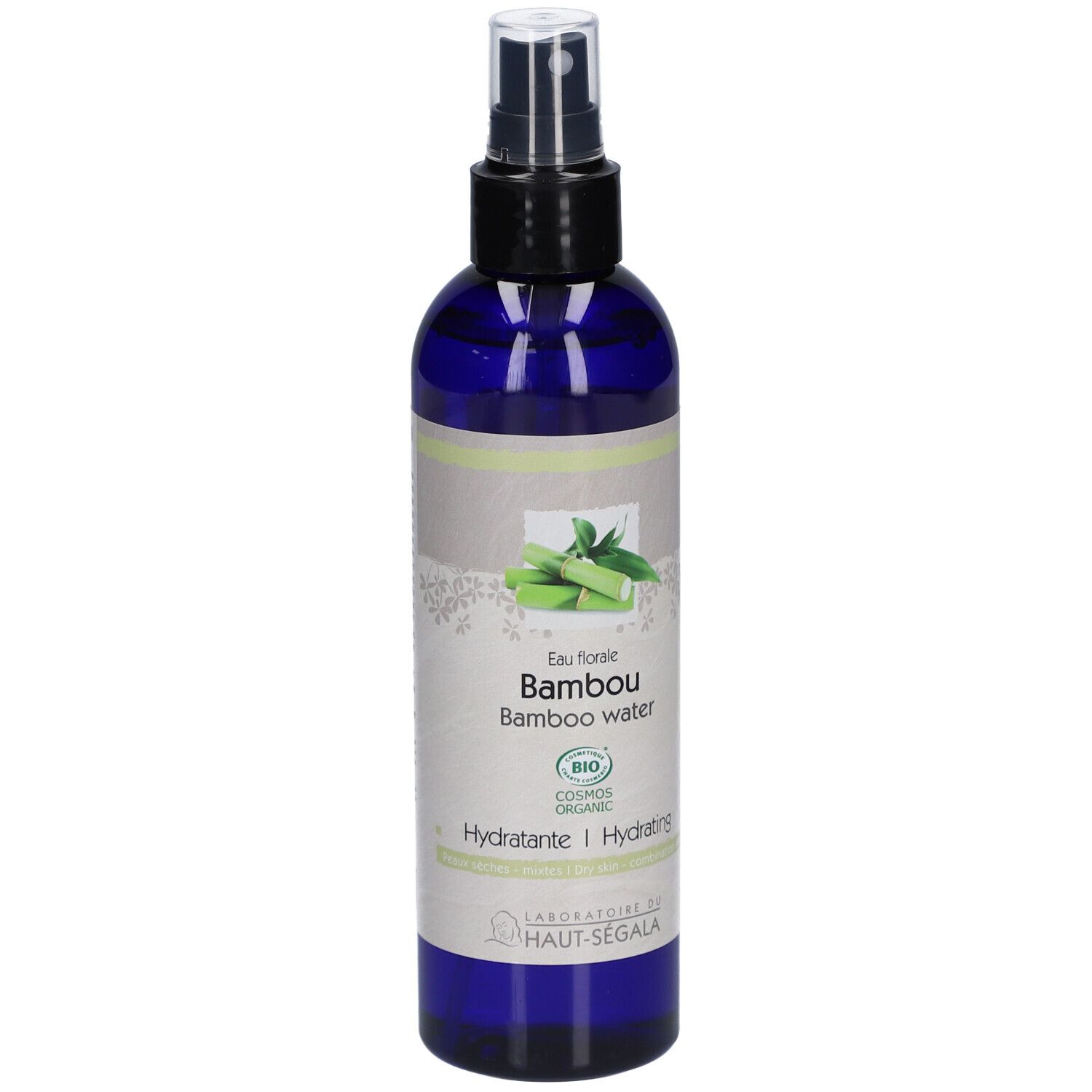 Flacon bleu avec vaporisateur noir. Étiquette avec illustration de bambou et texte: Eau florale Bambou, Hydratante.