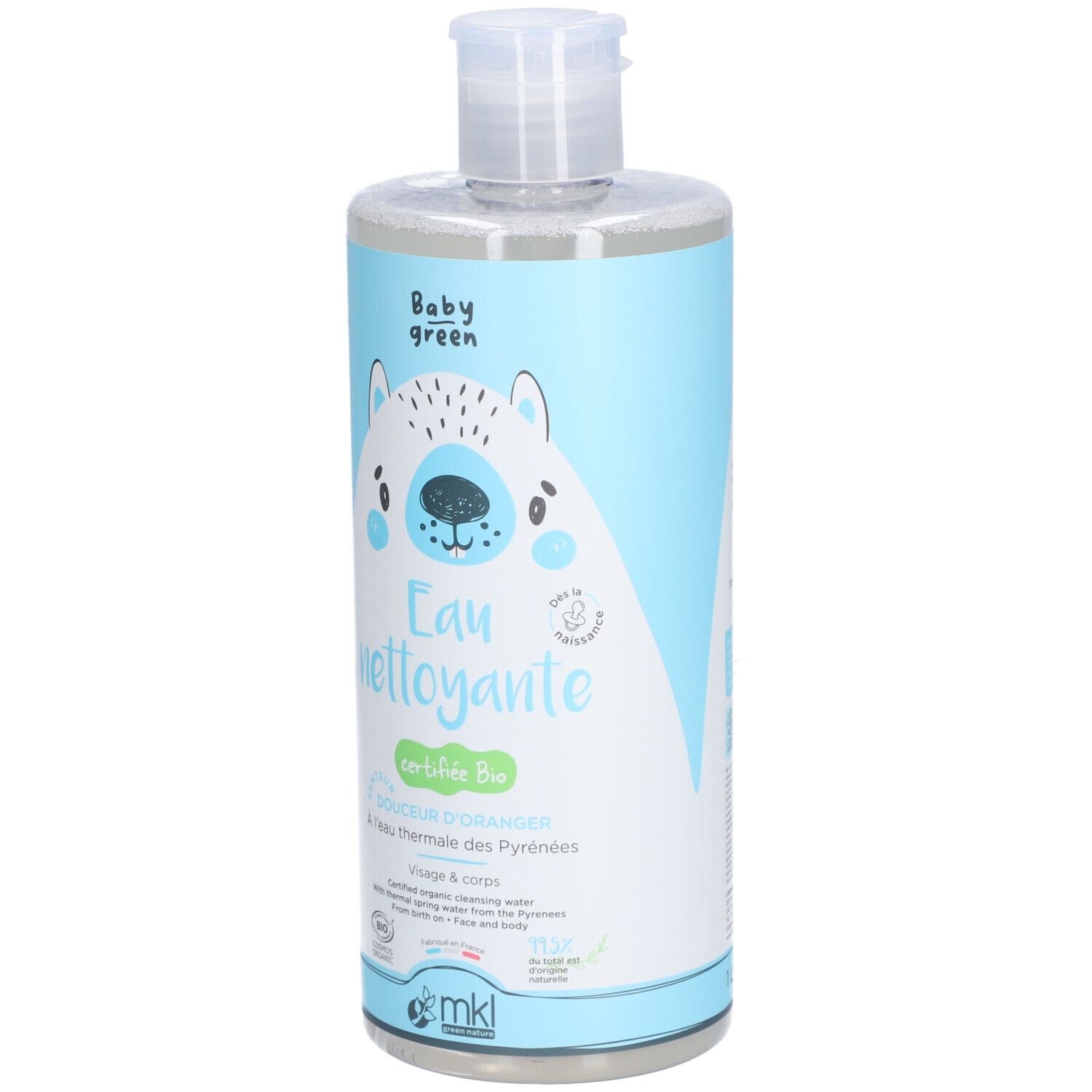 Fles Baby Green Eau Nettoyante. Lichtblauwe fles met beer-illustratie. Tekst: Eau nettoyante, certifié Bio, à l'eau thermale des Pyrénées.