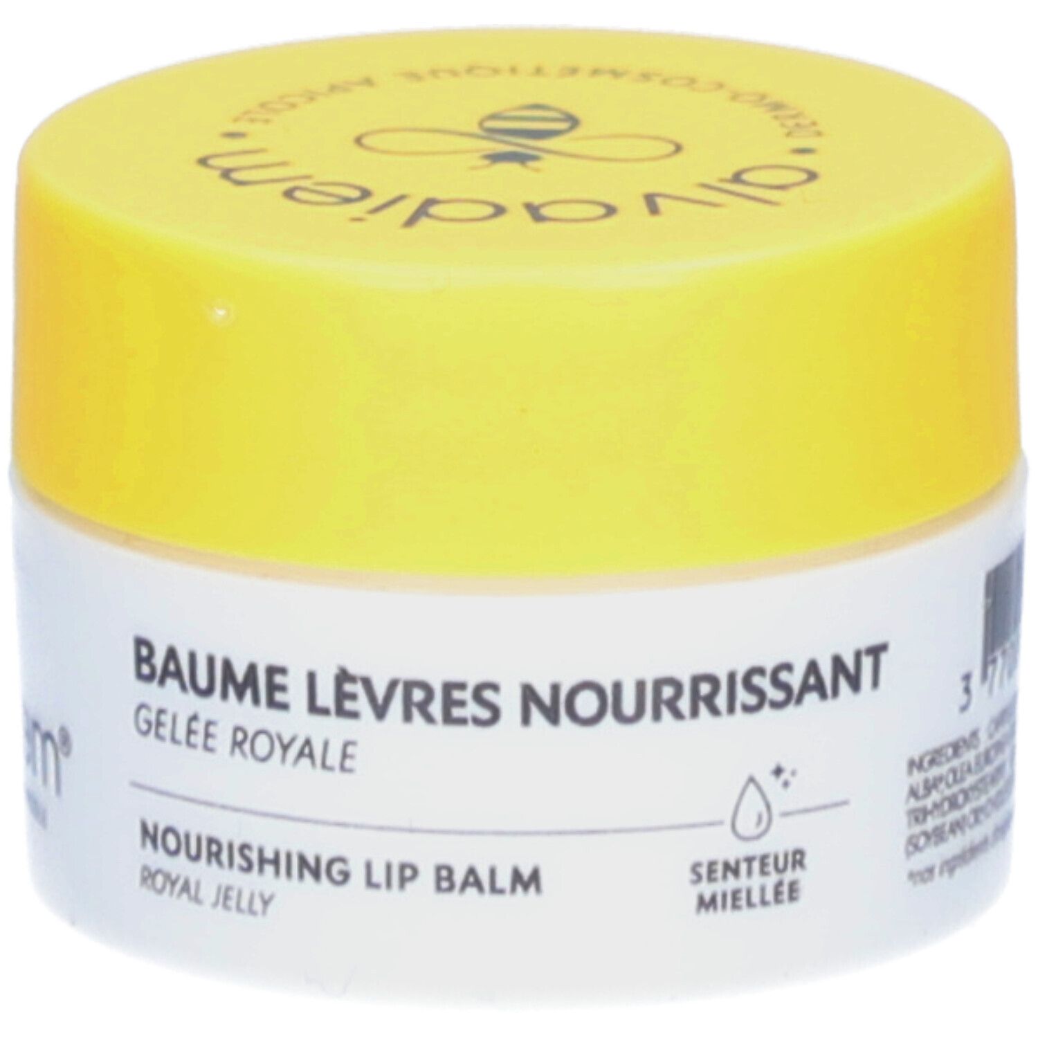 Wit en gele pot. Opschrift: Baume Lèvres Nourrissant, Gelee Royale, Nourishing Lip Balm, Senteur Miellée.