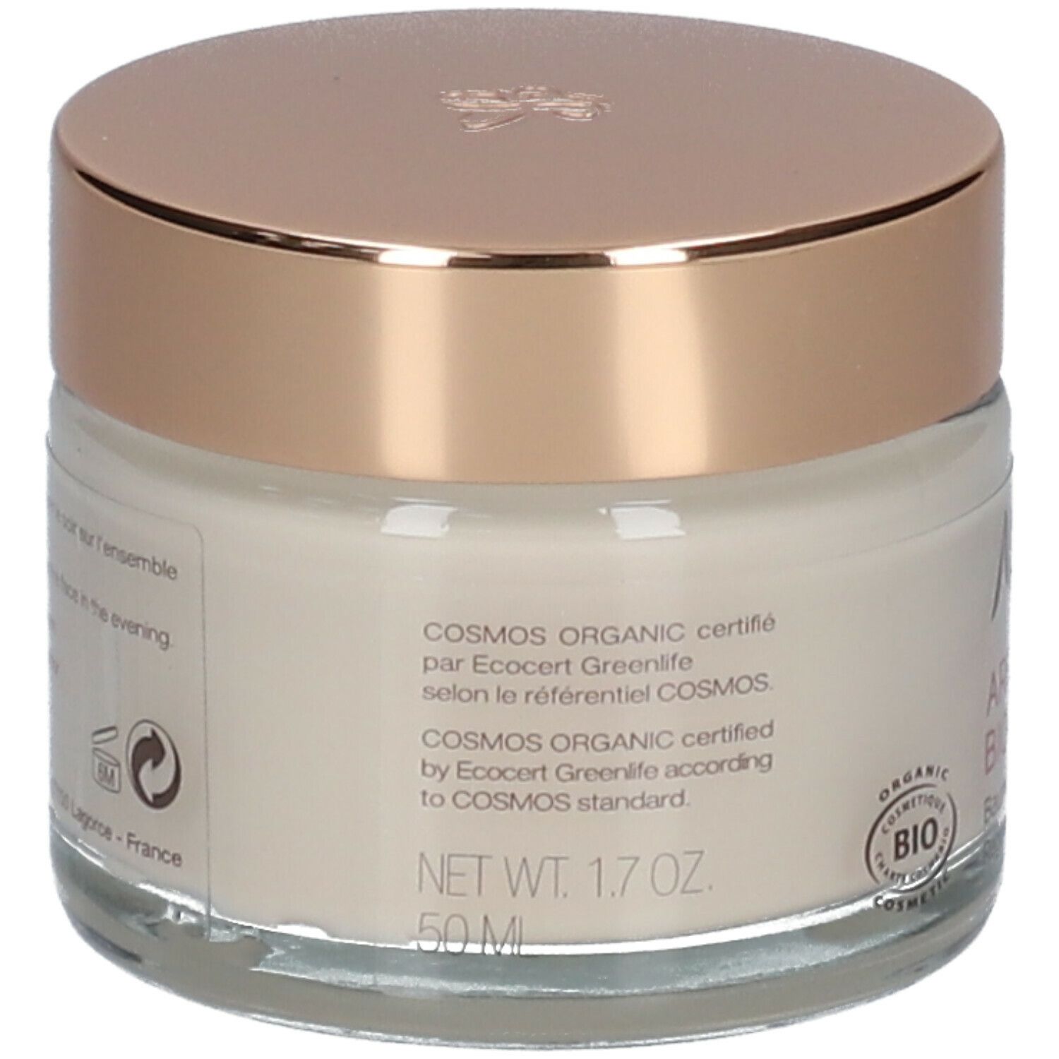 Achterkant van de crèmepot. Tekst: COSMOS ORGANIC gecertificeerd. 50 ml, 1.7 OZ. Bio-certificering.