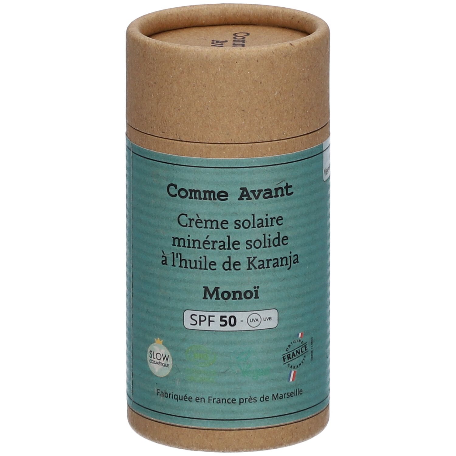 Cilindrische verpakking zonnecrème. Opschrift: Comme Avant, Crème solaire minérale solide, SPF 50, Monoi.