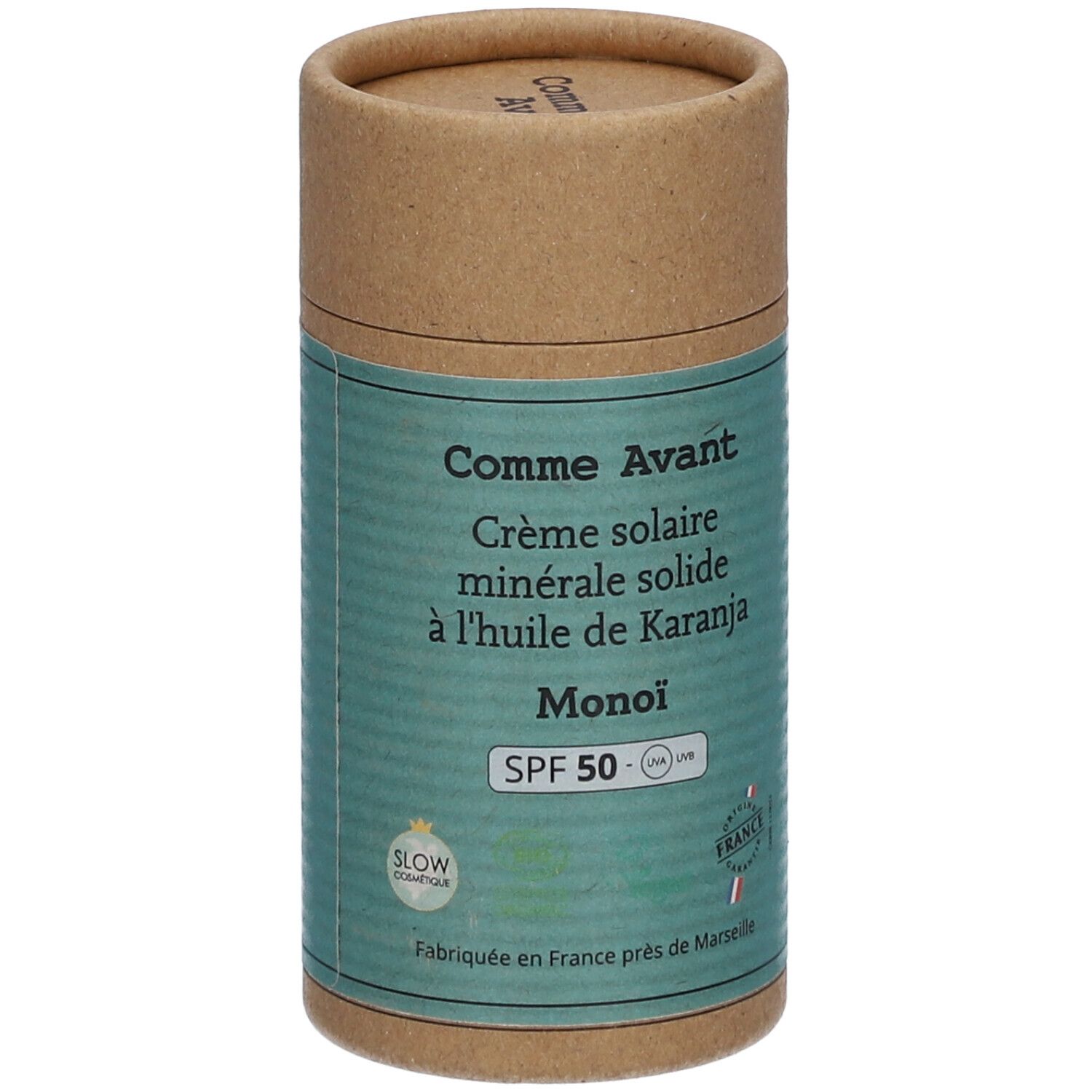 Cilindrische verpakking zonnecrème. Opschrift: Comme Avant, Crème solaire minérale solide, SPF 50, Monoi.
