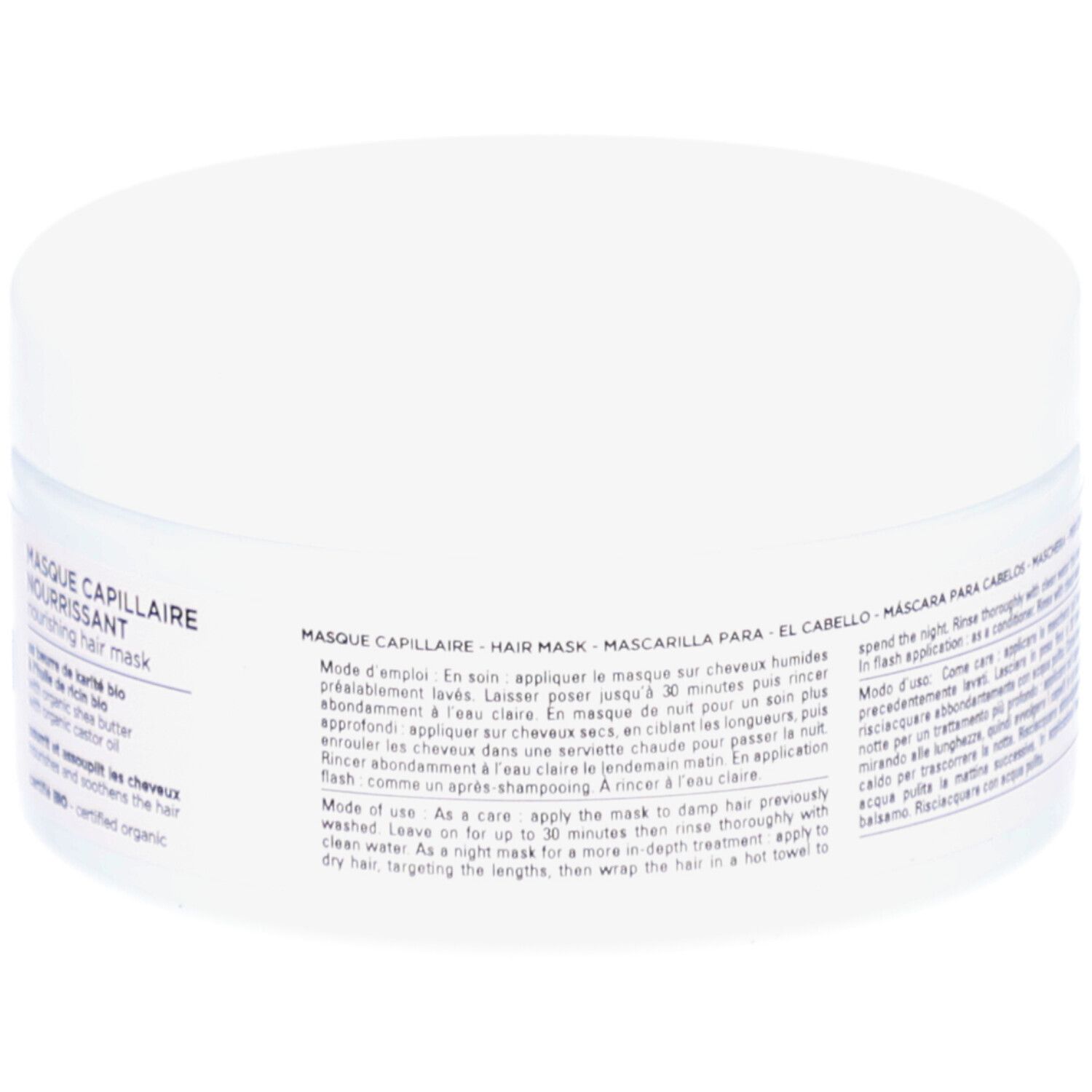 Witte pot, achterkant. Opschrift: Masque Capillaire Nourrissant. Gebruiksaanwijzing.