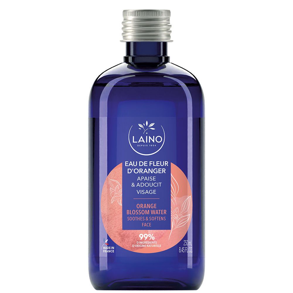 Flacon bleu en verre, bouchon argenté. LAINO Eau de Fleur d'Oranger. Texte: Apaise & adoucit visage, 99% ingrédients d'origine naturelle.